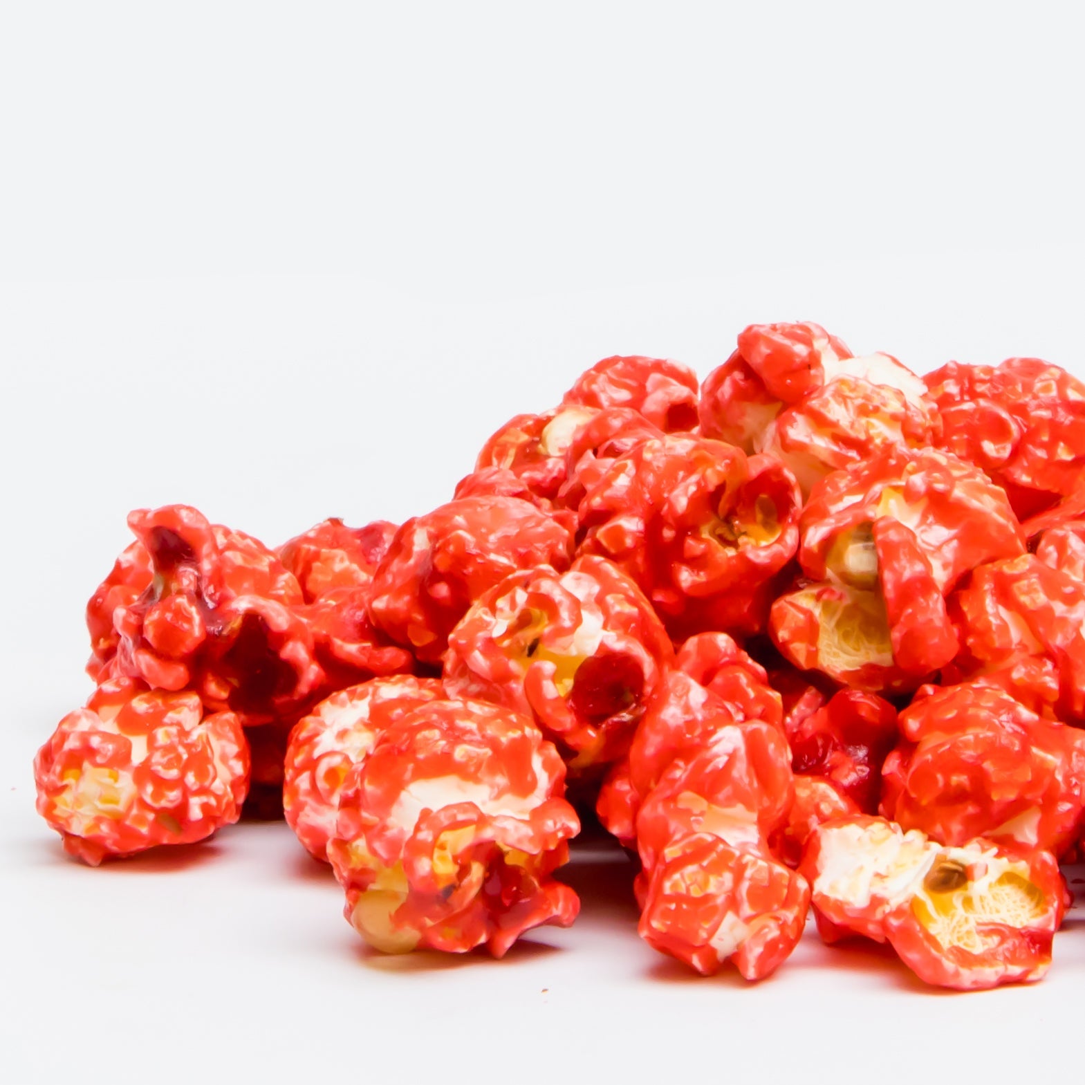 Cinnamon popcorn in a bag from Colorado Popcorn Company, 5 oz, with cinnamon-flavored coated popcorn visible in the image.