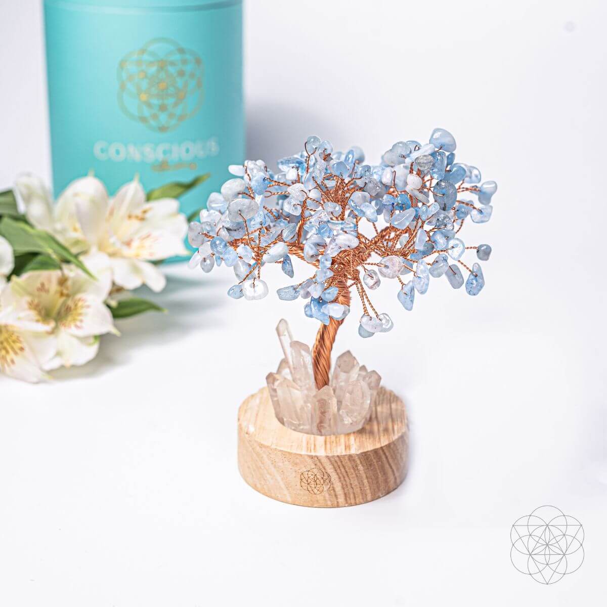 Night light featuring a guardian angel and aquamarine tree design, providing protection and calming light from Conscious Items.