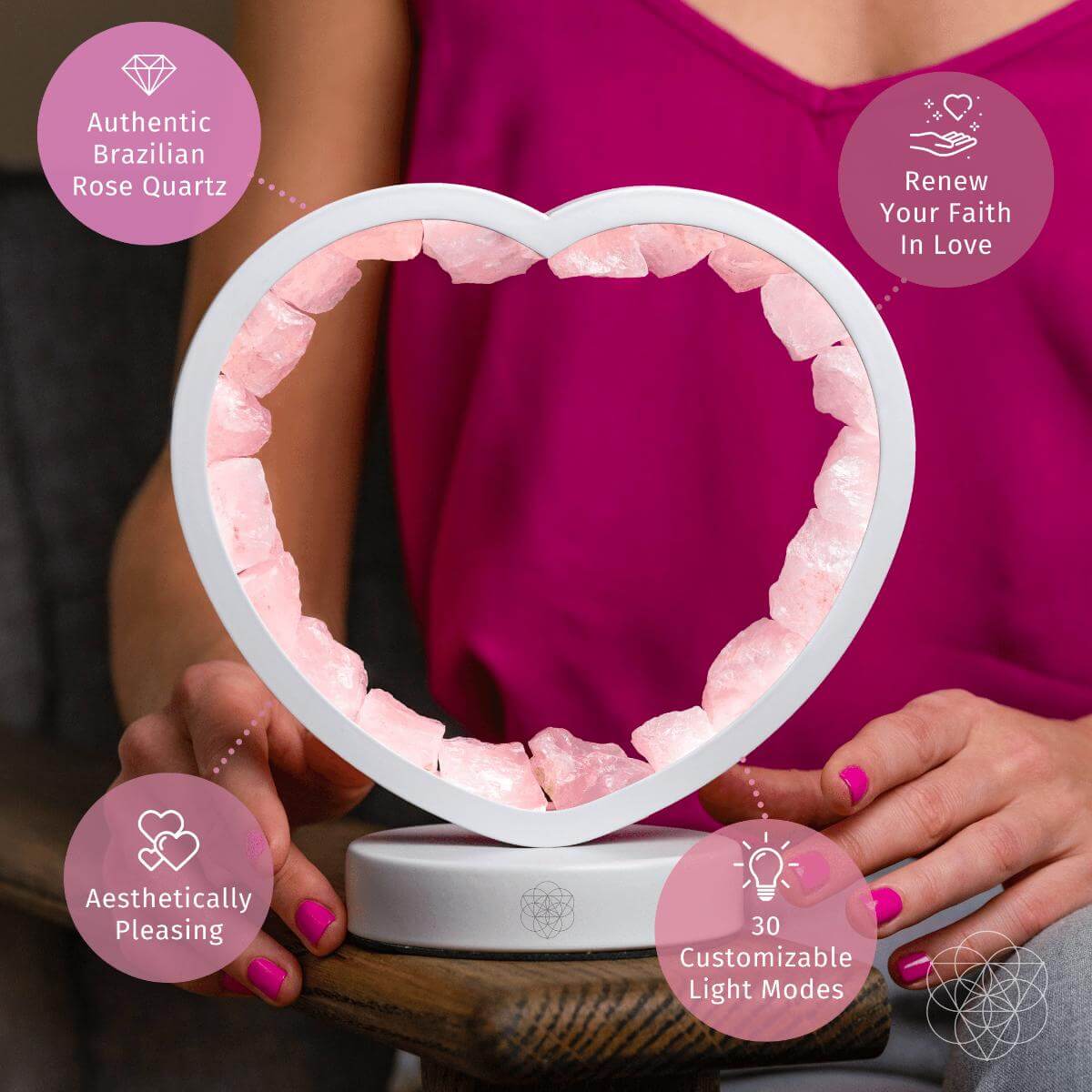Rose quartz heart night light by Conscious Items, featuring a Love Magnet design, glowing softly as a calming bedside lamp.