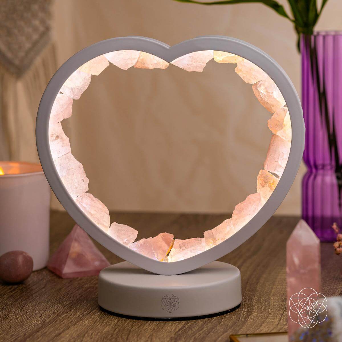 Rose quartz heart-shaped night light by Conscious Items, Love Magnet lamp with soft glow and natural stone appearance.