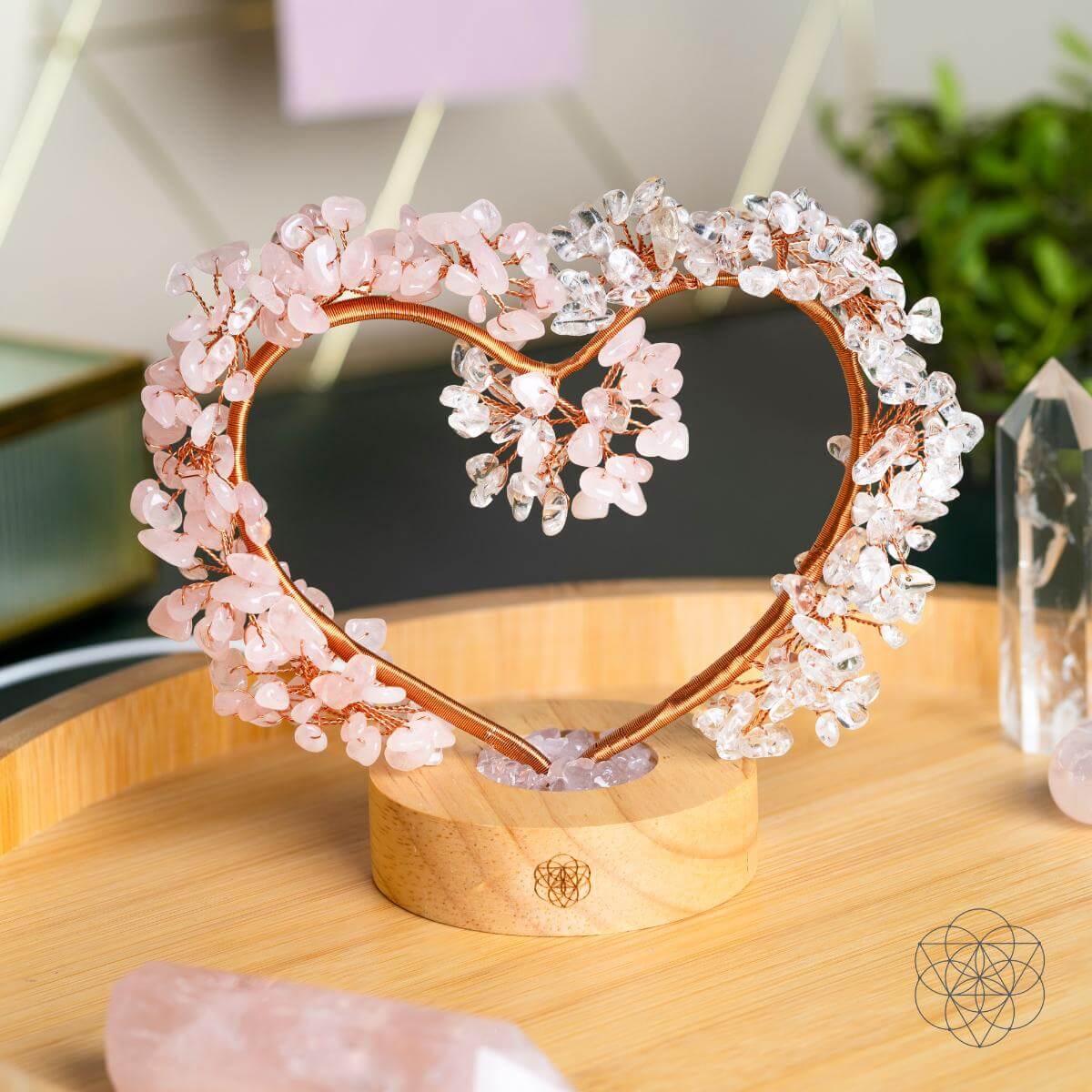 Conscious Items Mend My Broken Heart night light featuring a rose and clear quartz tree lamp with glowing branches and base.