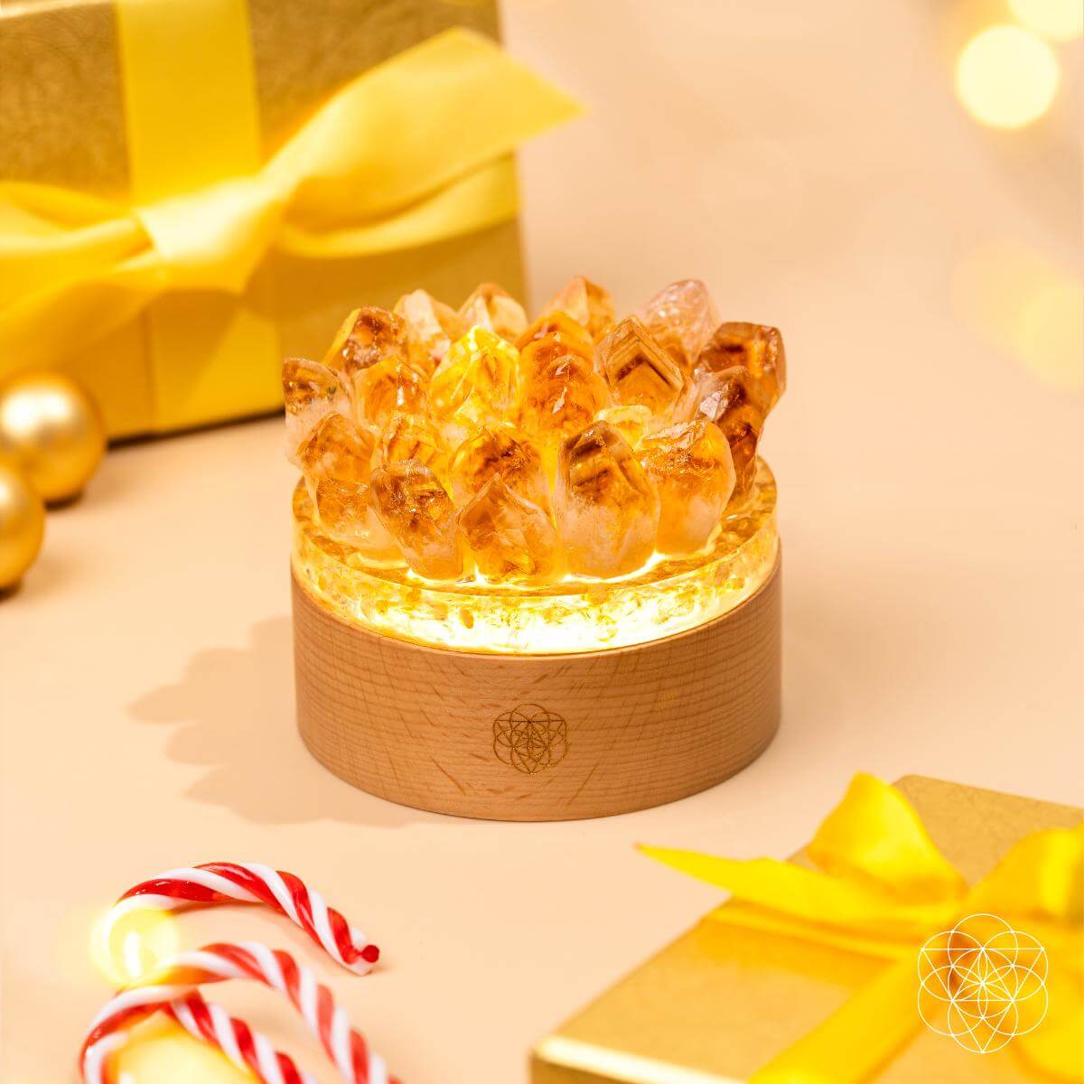 Conscious Items Midas Citrine Night Light titled "Turn My Life to Gold," featuring a warm, glowing citrine-inspired lamp on a wooden surface.