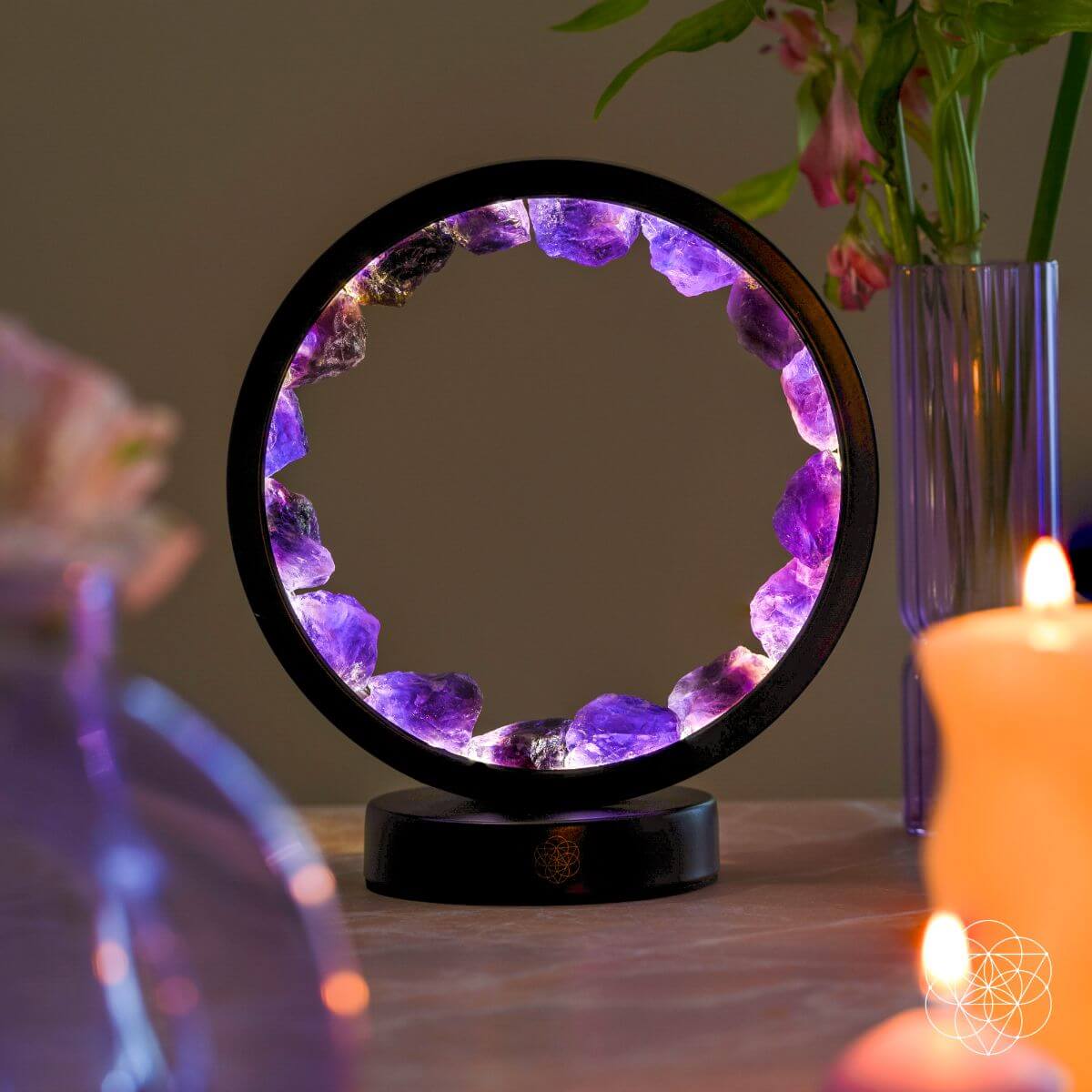 Spiritual protection amethyst night light by Conscious Items, glowing with calming purple light and featuring a crystal base.