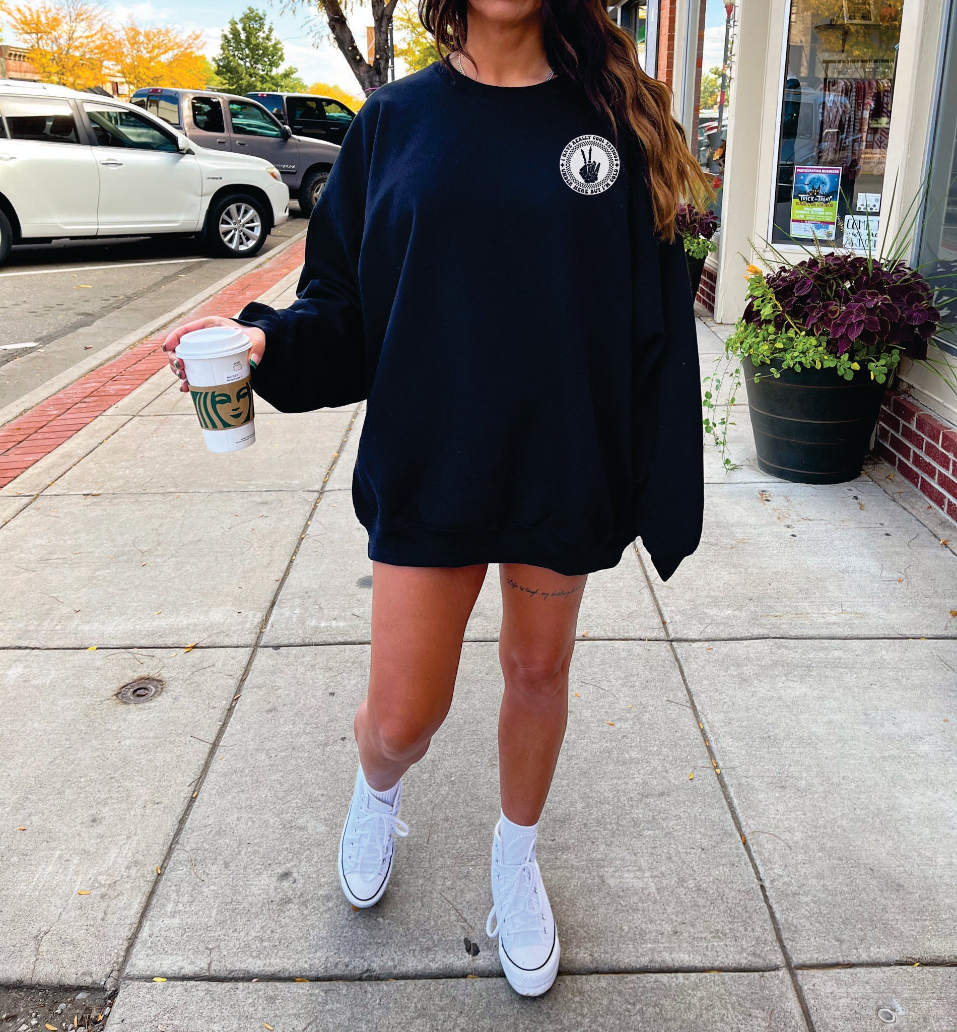 Black crewneck sweatshirt featuring a bold "I Have Really Cool Tattoos, But I'm Cold" graphic design, from Shop Karma Tees.