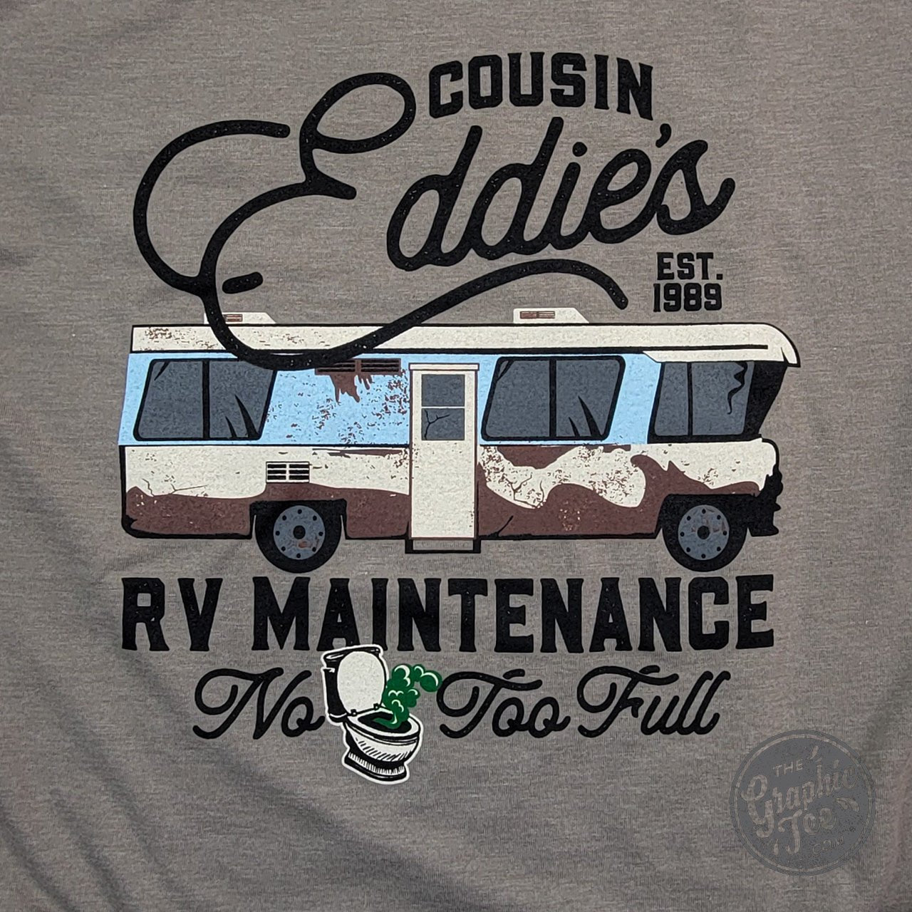 Cousin Eddie's RV Maintenance short sleeve graphic T-shirt by The Graphic Tee, featuring humorous RV repair illustration.