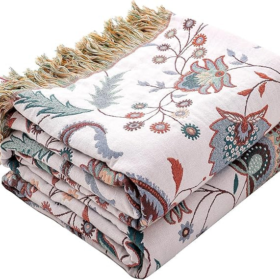 CozyNest Decor boho large cotton throw blanket with tassels, ultra-soft rustic quilt for sofa, bed, or travel decor.