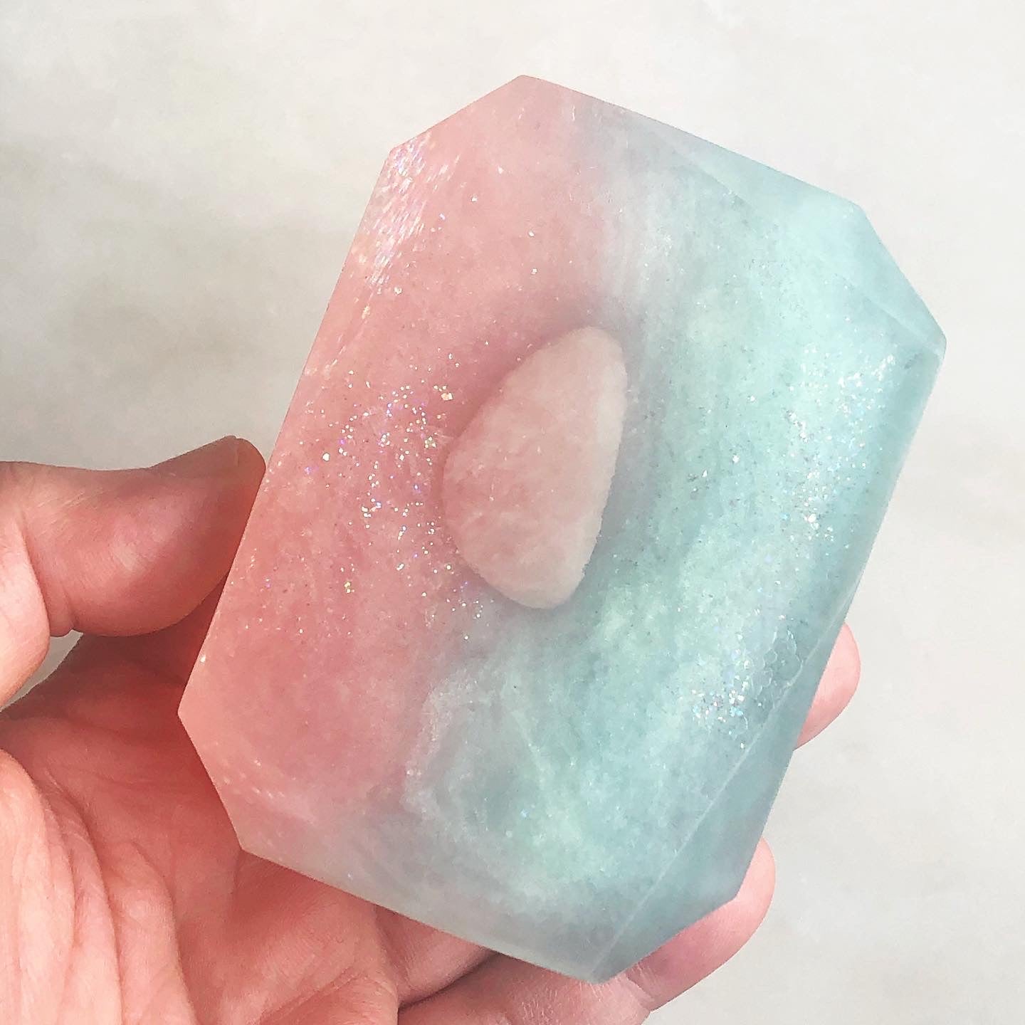 Love Spelled crystal soap by Crystal Irie with a smooth, transparent appearance and intricate crystal-like design.