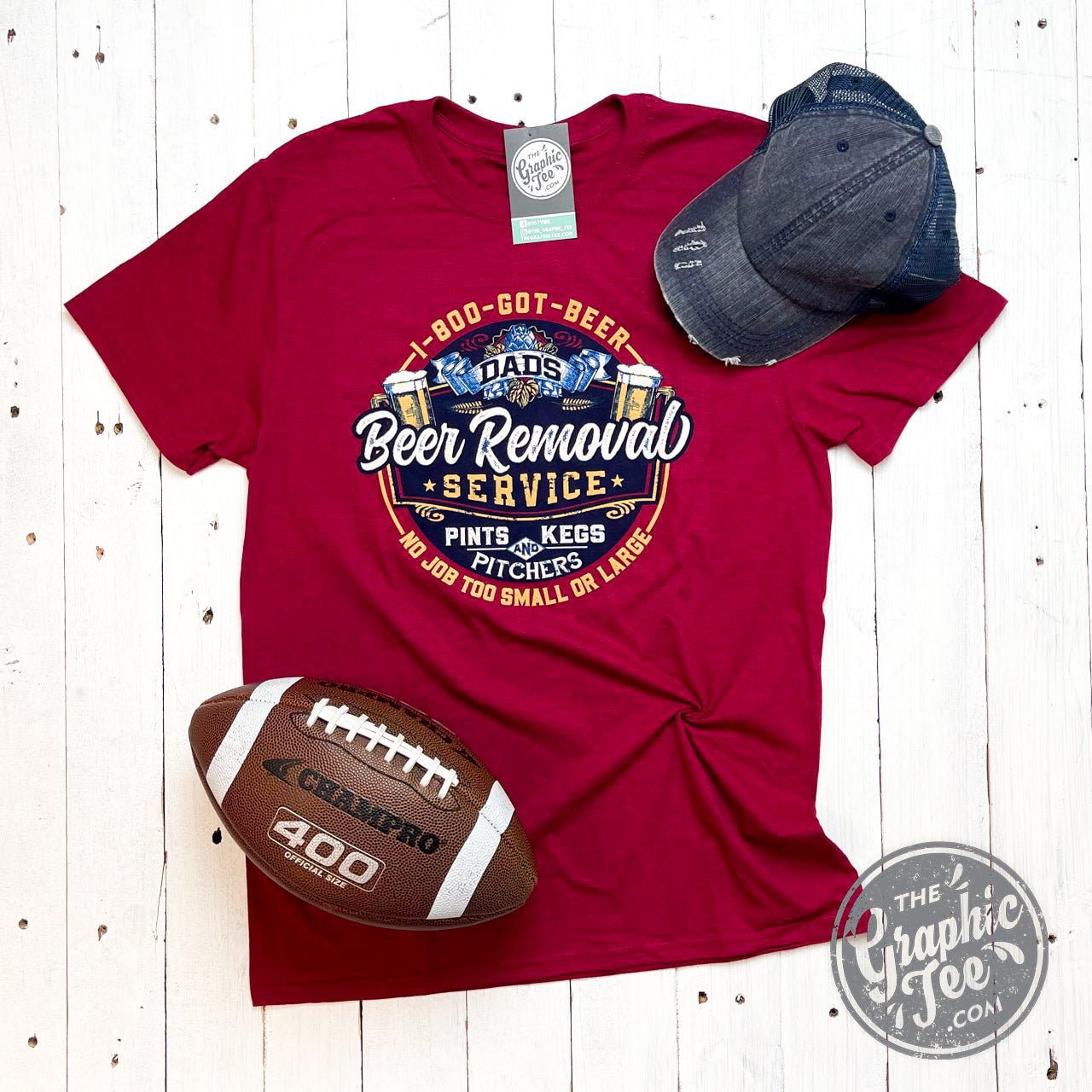 Men's short sleeve graphic tee by The Graphic Tee featuring a humorous Dad's Beer Removal Service design.