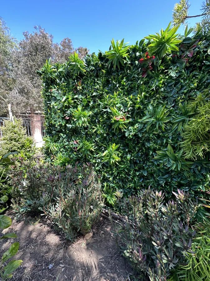 Green Meadows artificial vertical garden wall panel by Designer Plants USA, UV-resistant living wall for commercial or outdoor use.