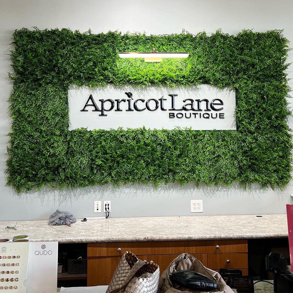 Lush Fern artificial vertical garden green wall panel by Designer Plants USA showing lush greenery on UV-resistant living wall.