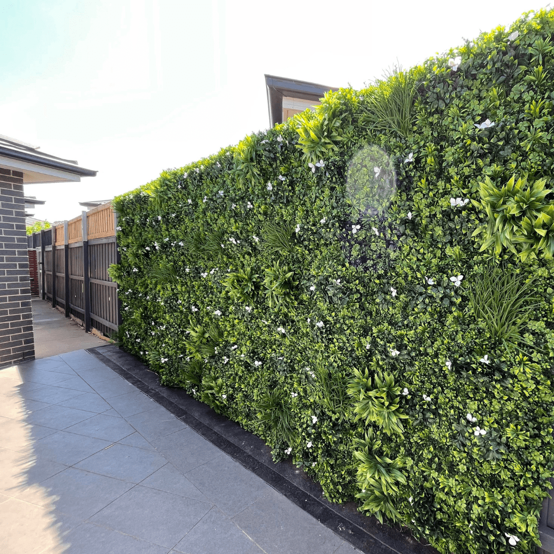 White Oasis artificial vertical garden wall panel by Designer Plants USA, UV resistant living wall for commercial or home use.