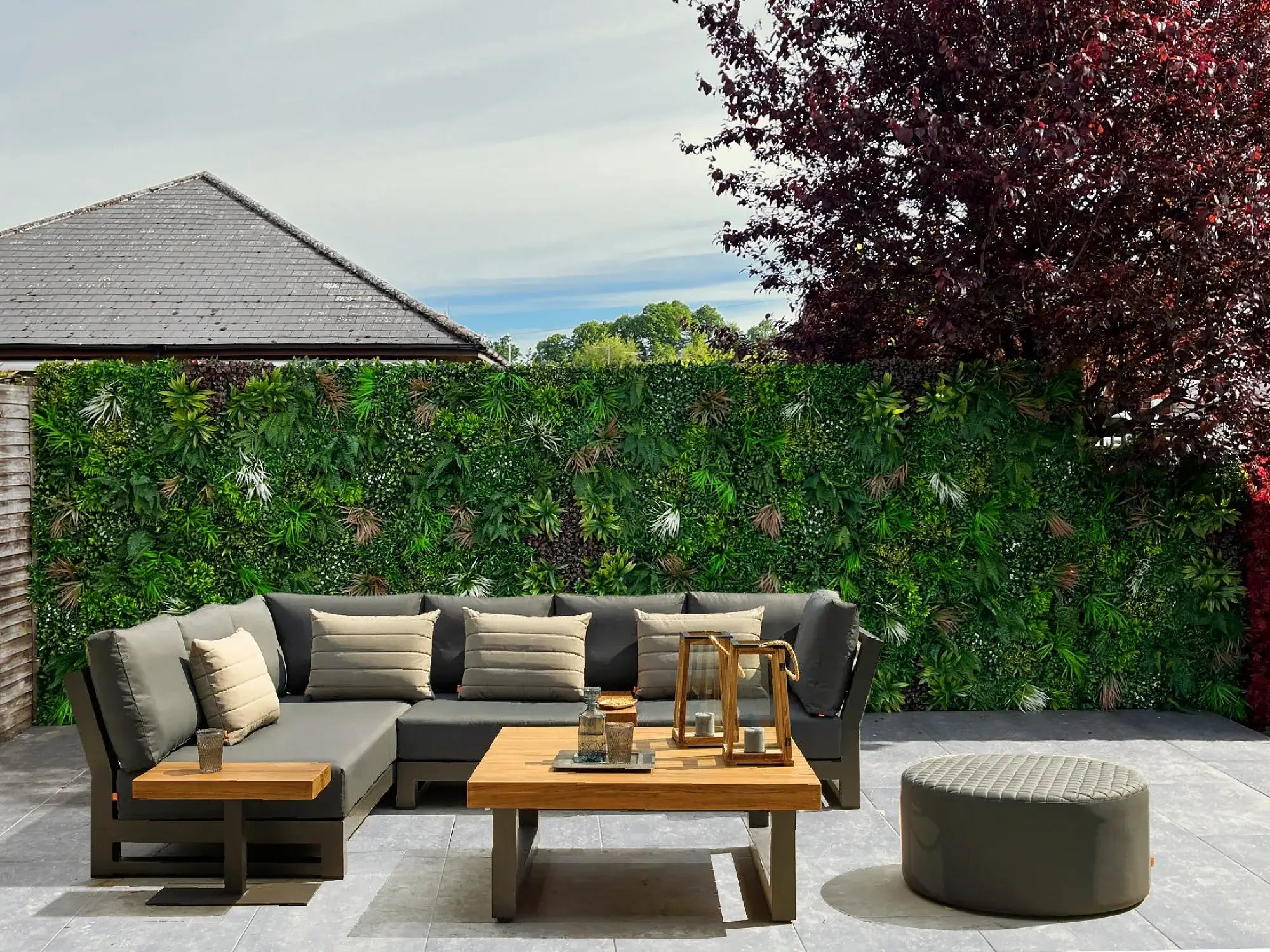 Wild Tropics artificial vertical garden wall panel by Designer Plants USA, green living wall with UV-resistant, lush foliage.