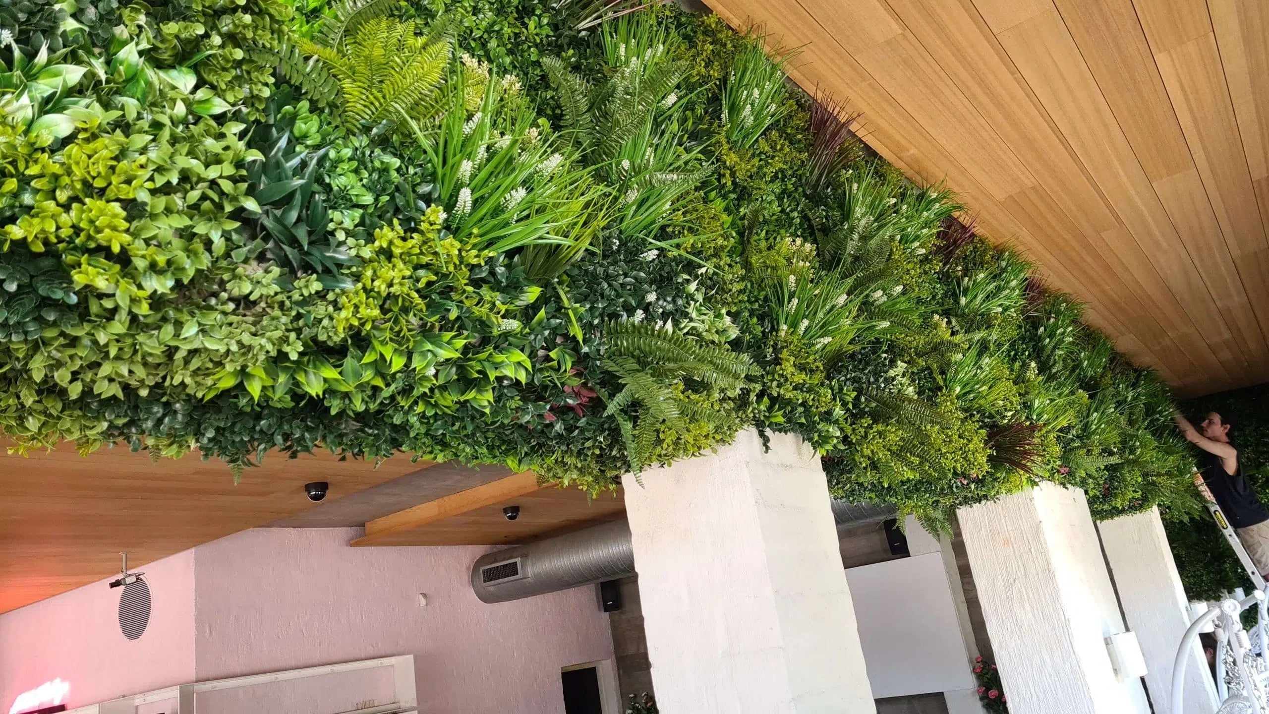 Small sample of Lush Spring vertical garden panel by Designer Plants USA, showcasing vibrant artificial greenery for wall decor.