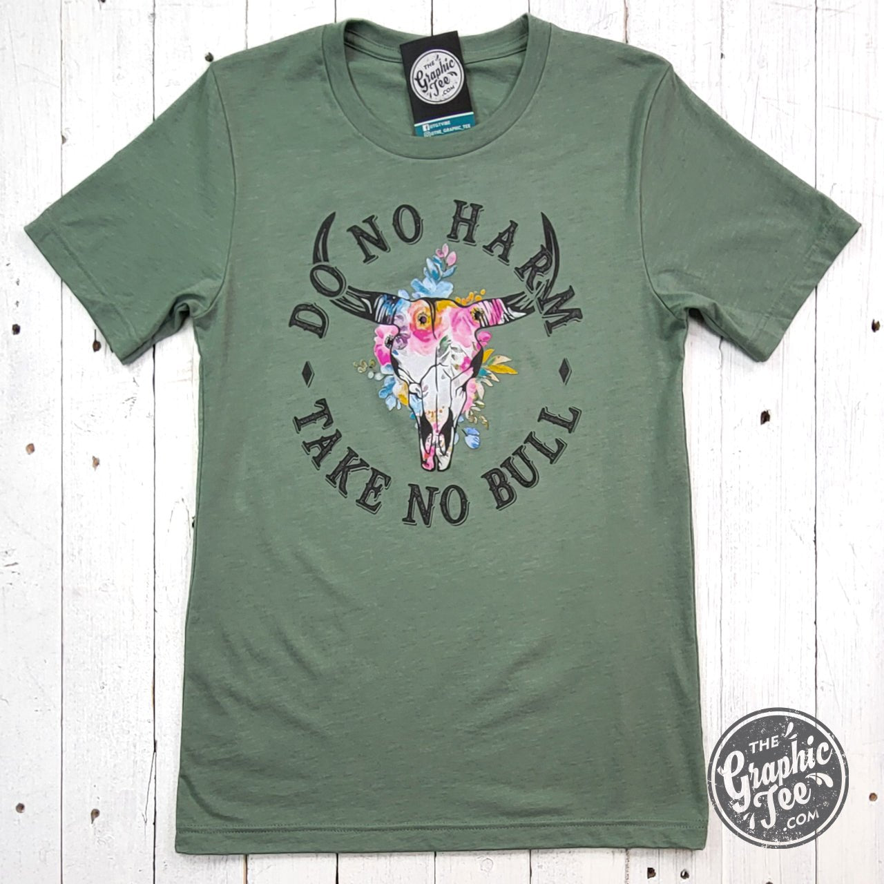 Heather sage crewneck short sleeve graphic tee from The Graphic Tee with "Do No Harm Take No Bull" design.