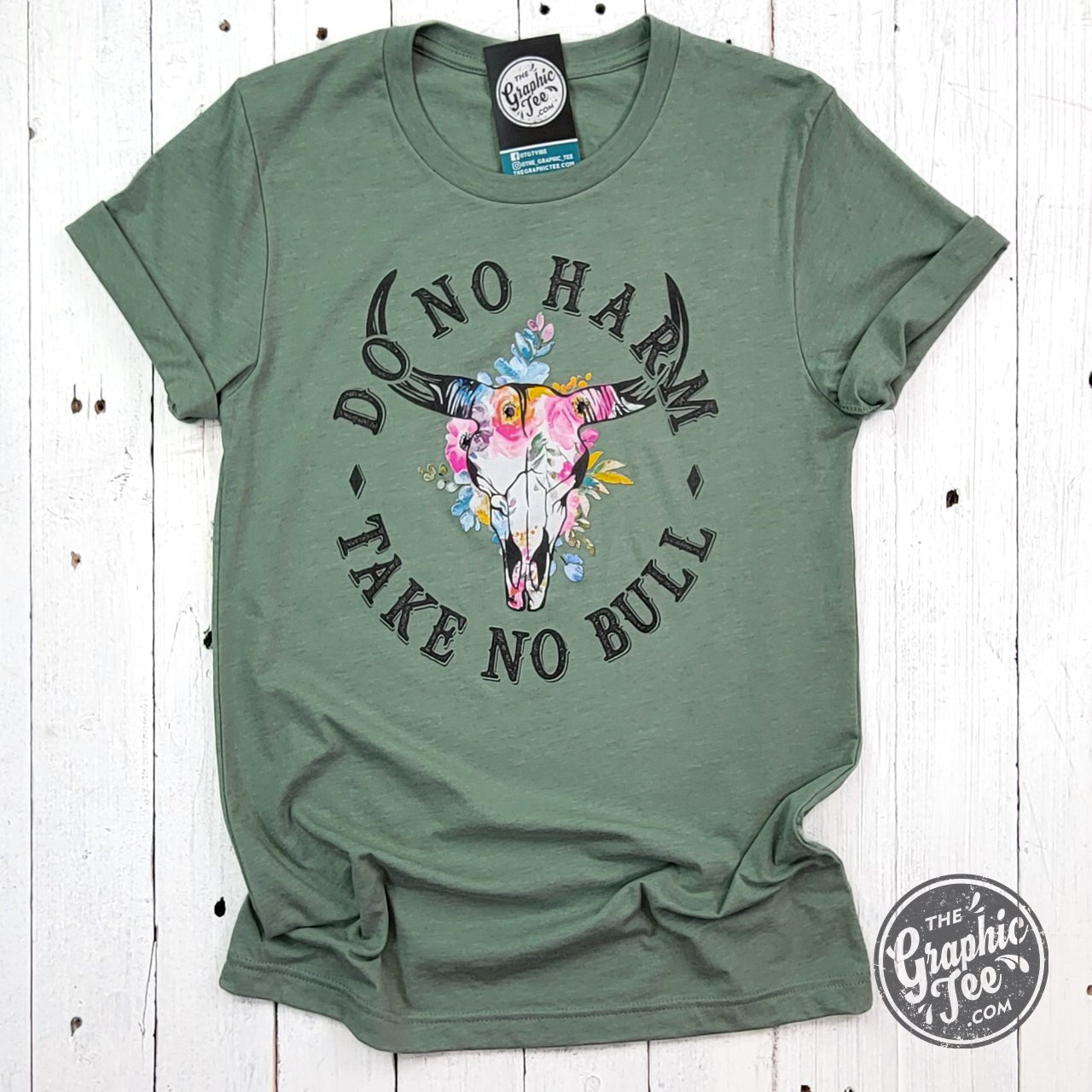 Heather sage crewneck short sleeve graphic tee by The Graphic Tee featuring the "Do No Harm Take No Bull" design.
