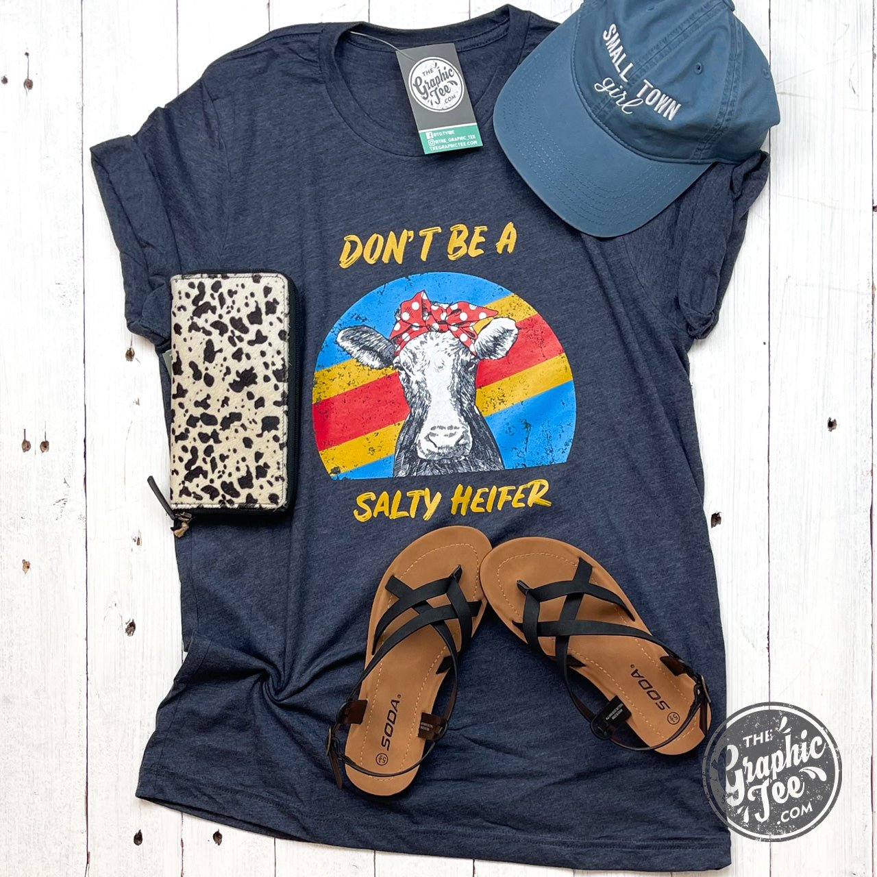 Heather midnight navy graphic t-shirt with "Don't Be A Salty Heifer" slogan from The Graphic Tee, casual unisex style.