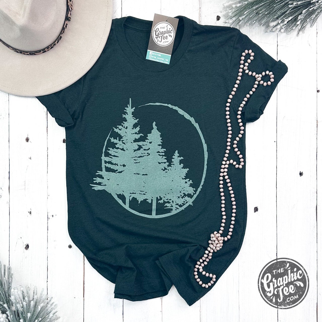 Evergreens Heather Emerald short sleeve graphic tee by The Graphic Tee, featuring a vibrant green color and casual fit.