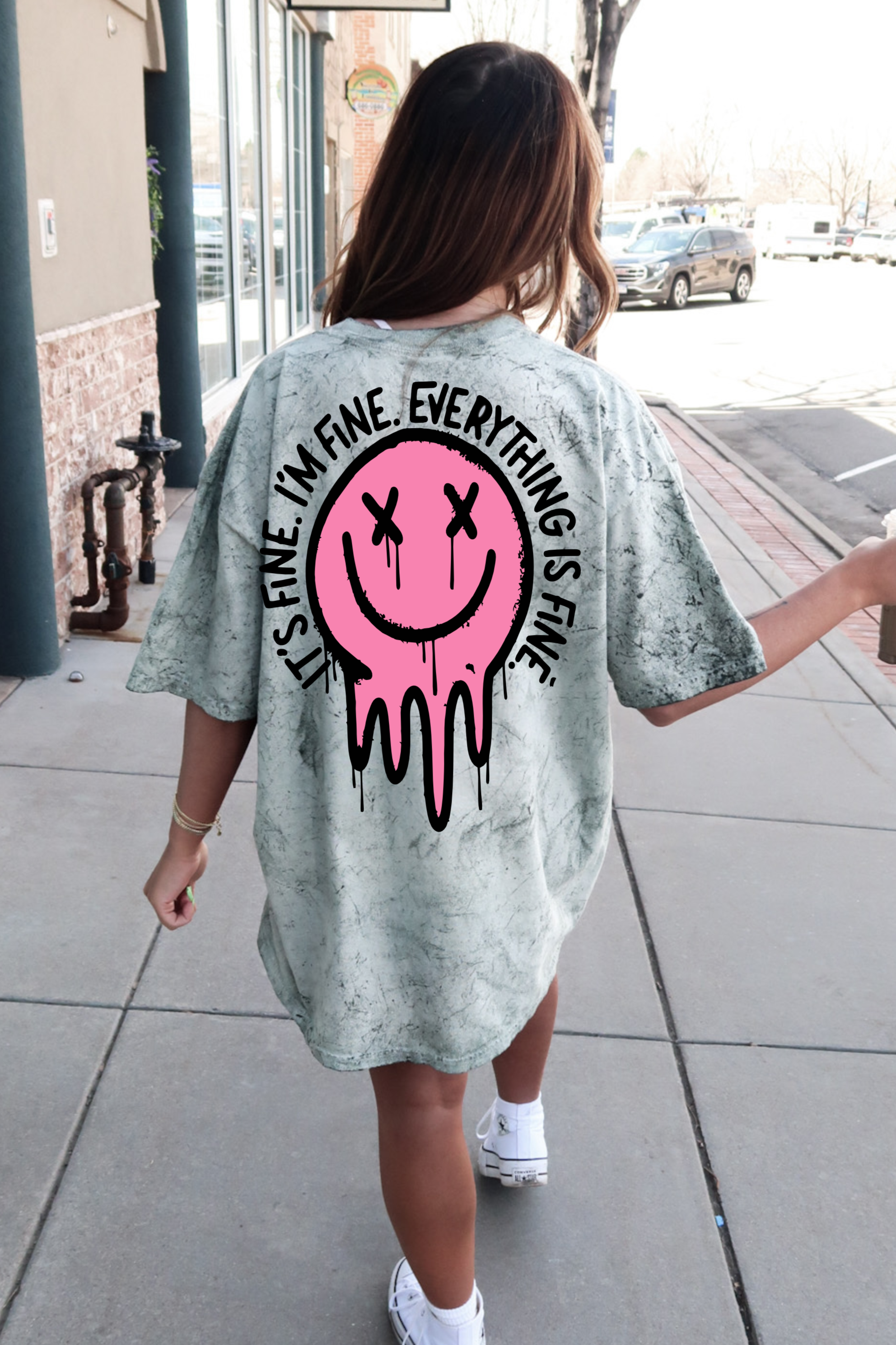 It's Fine Smiley Graphic on a T-shirt from Shop Karma Tees, featuring a cheerful yellow smiley face with "It's Fine" text.
