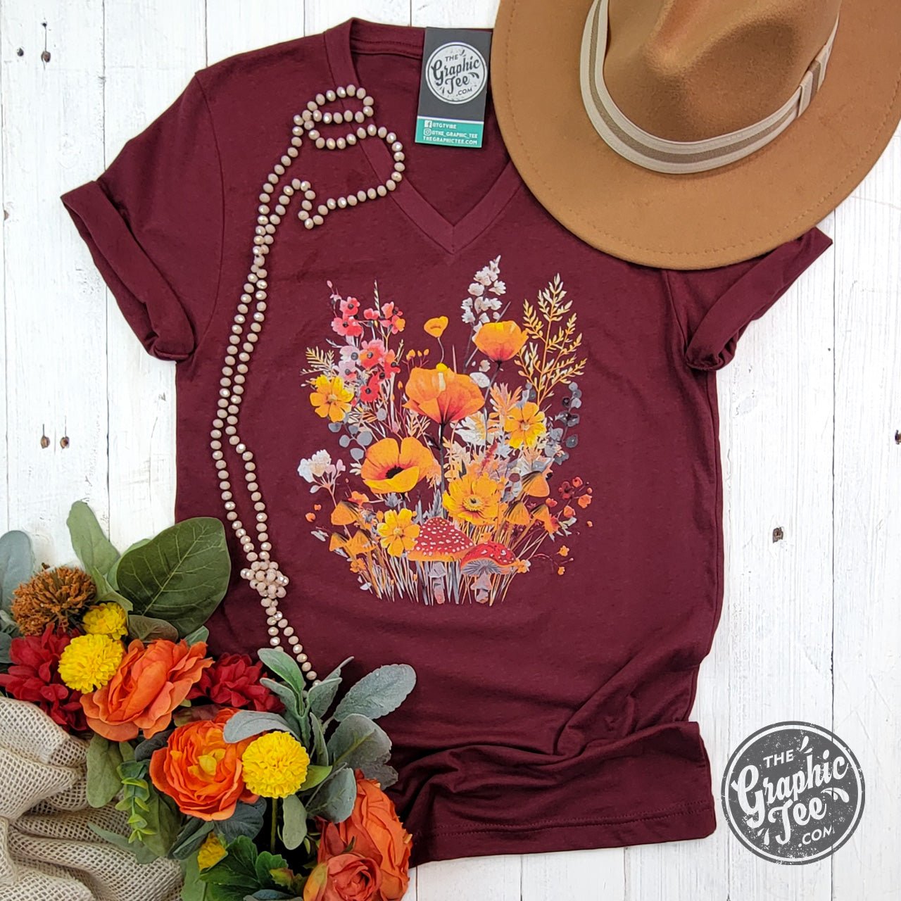 Fall Boho Floral Heather Cardinal short sleeve V-neck tee for women, featuring floral design and casual graphic style by The Graphic Tee