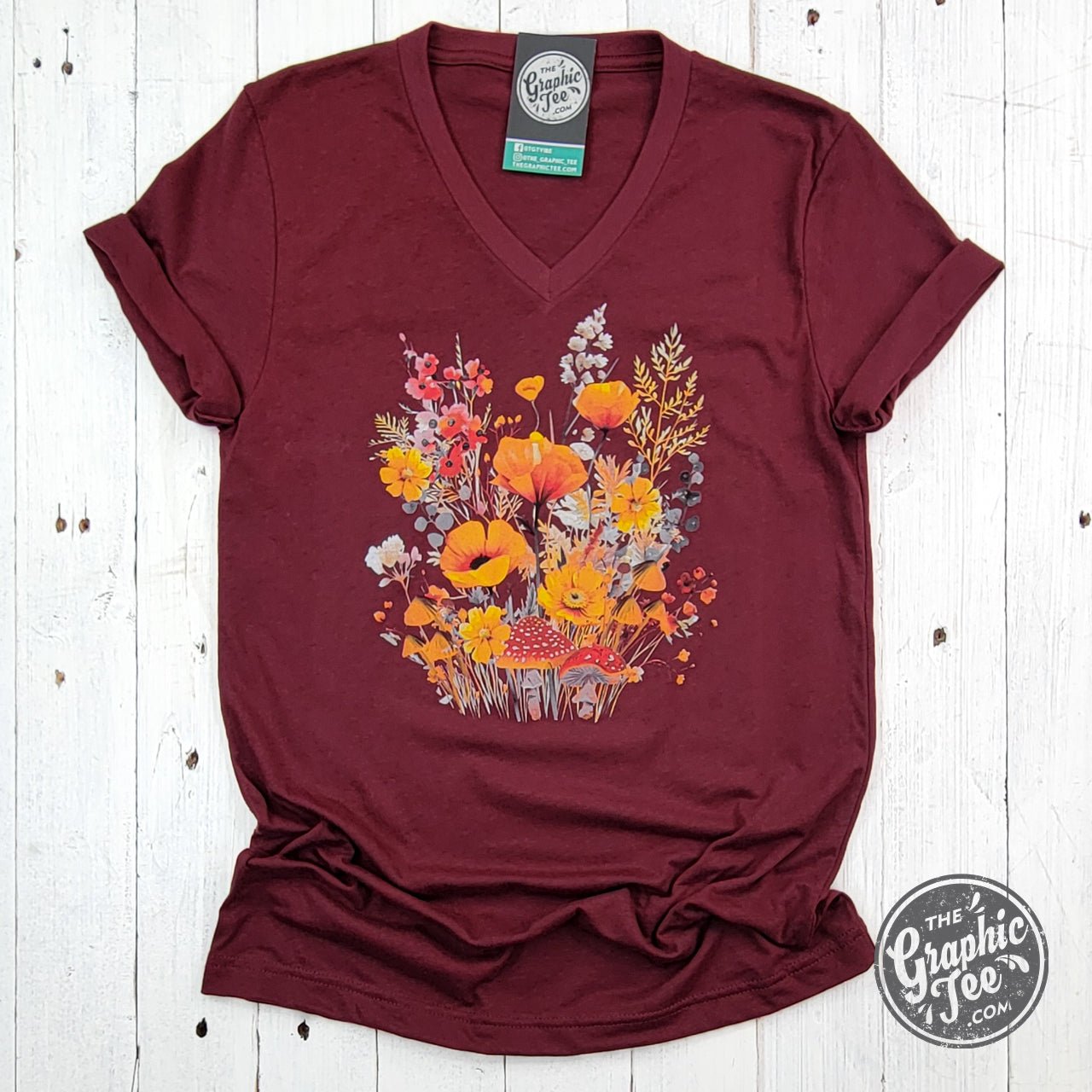 Fall boho floral Heather Cardinal V-neck short sleeve graphic tee from The Graphic Tee, featuring a vibrant floral design and casual fit.