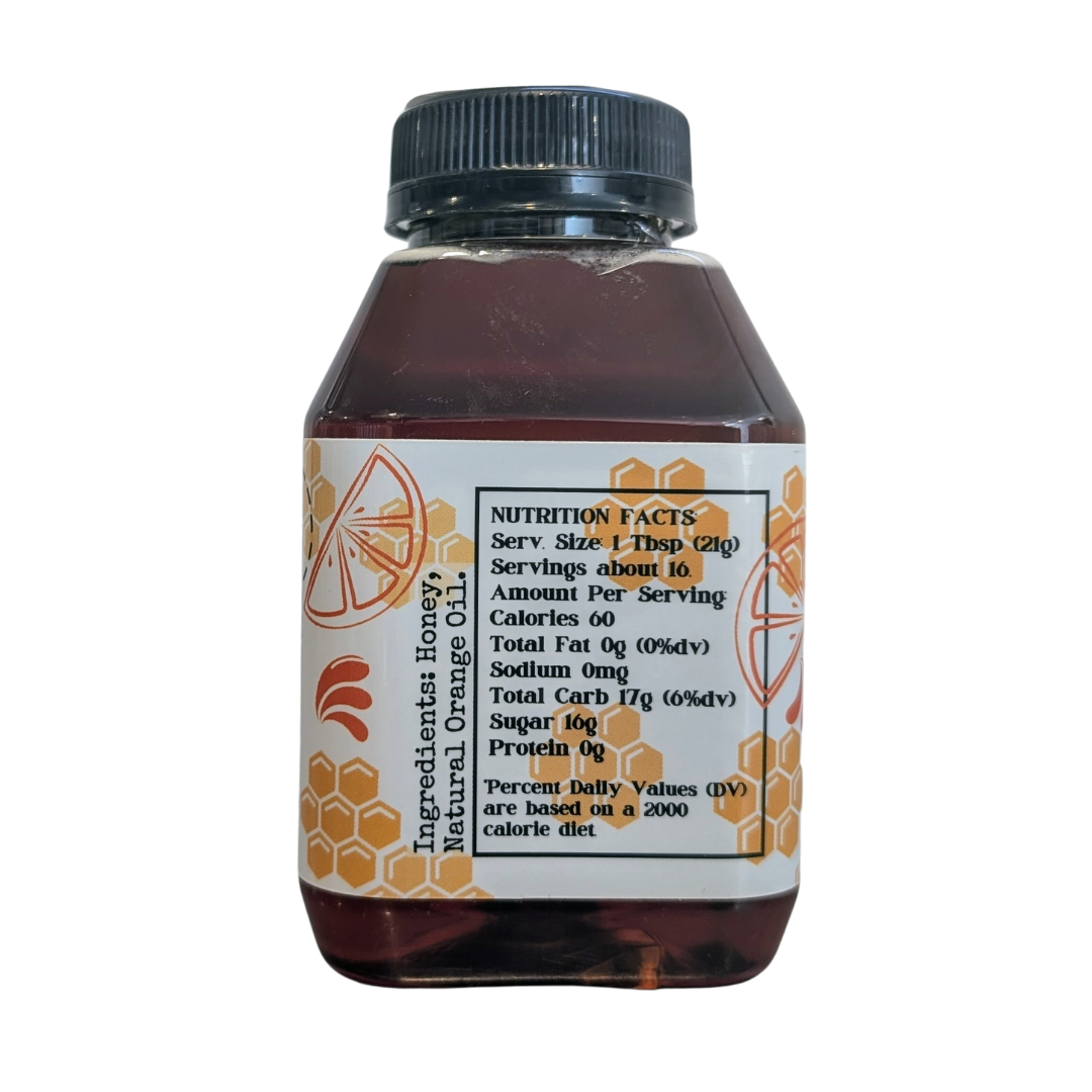 Jar of FARMERS Lavender Co. orange infused honey with a golden-orange hue, showcasing the infused honey in a clear glass jar.