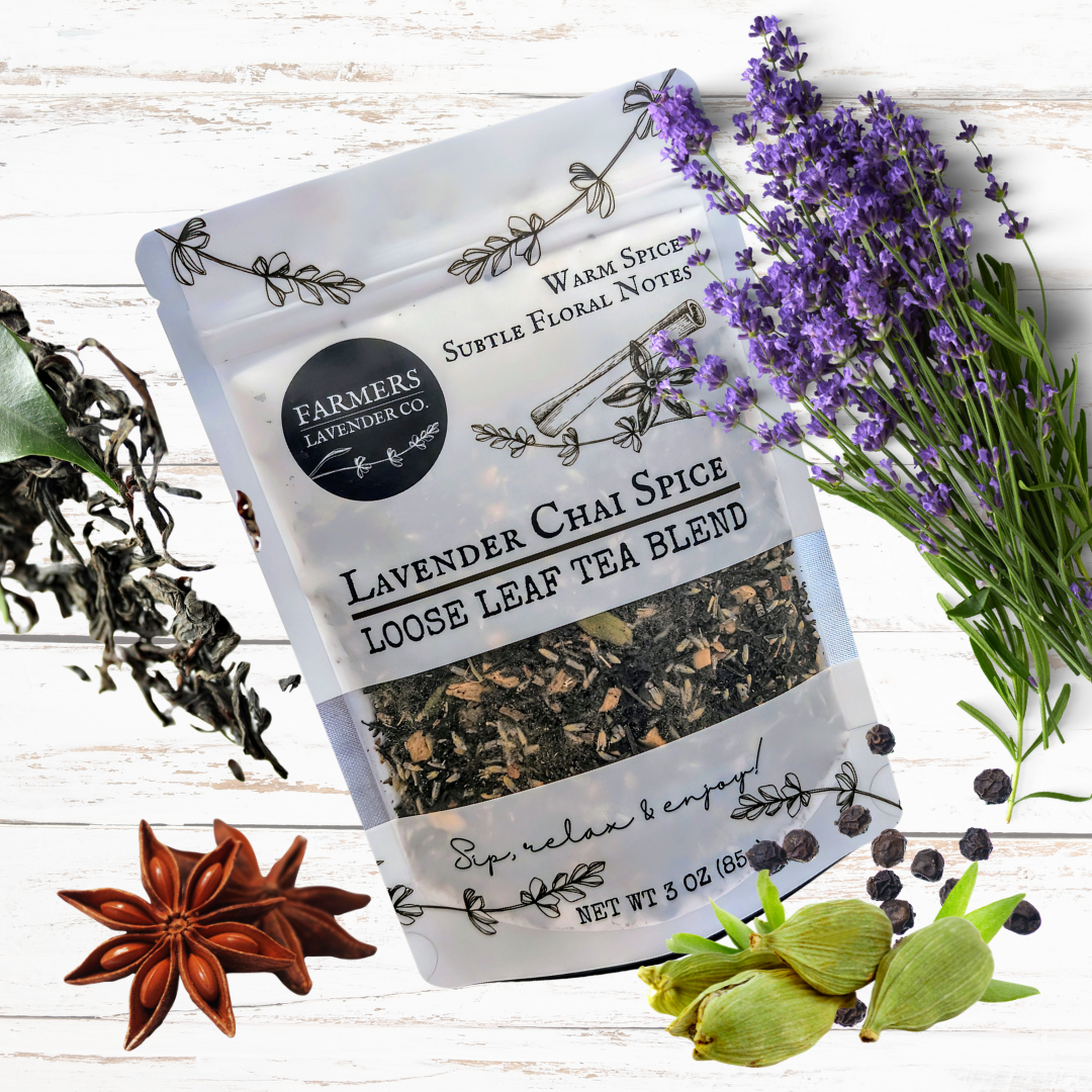 Loose leaf Lavender Chai Spice tea blend by FARMERS Lavender Co. with dried lavender, tea leaves, and chai spices in a jar.
