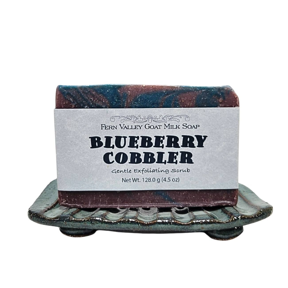 Fern Valley Goat Milk Soap with blueberry cobbler exfoliating scrub, featuring fresh blueberries and creamy soap texture.