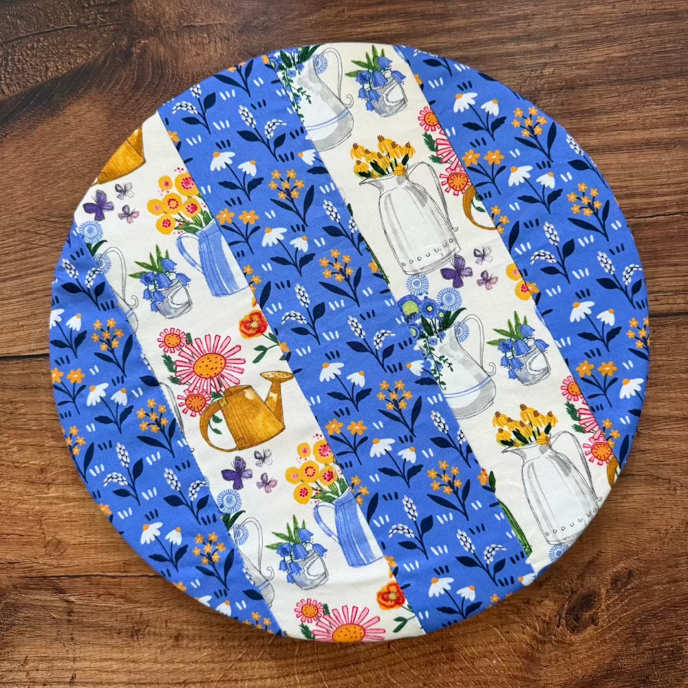 Medium bowl and banneton covers from Five Oaks Farm, featuring autumn mushroom design, for bread proofing and baking.