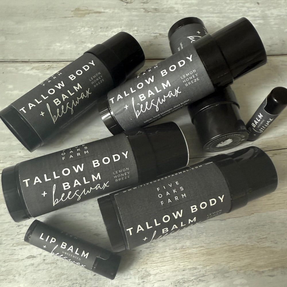 Four Oaks Farm Tallow Body Balm jar showing natural ingredients and rustic packaging for nourishing skincare.