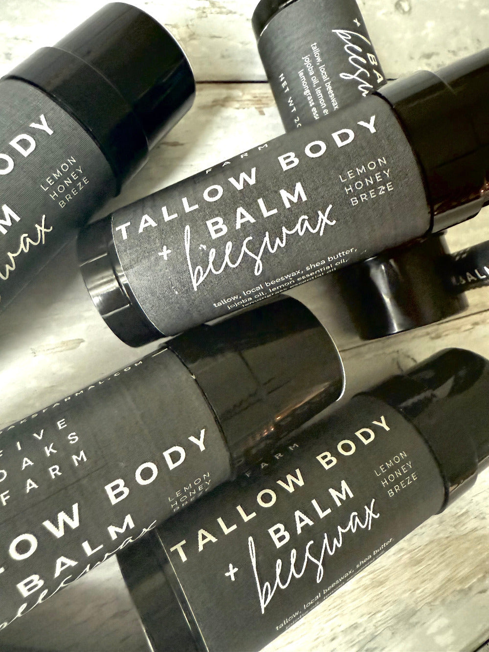 Five Oaks Farm Tallow Body Balm jar showing natural balm texture and rustic label, highlighting handcrafted skincare.