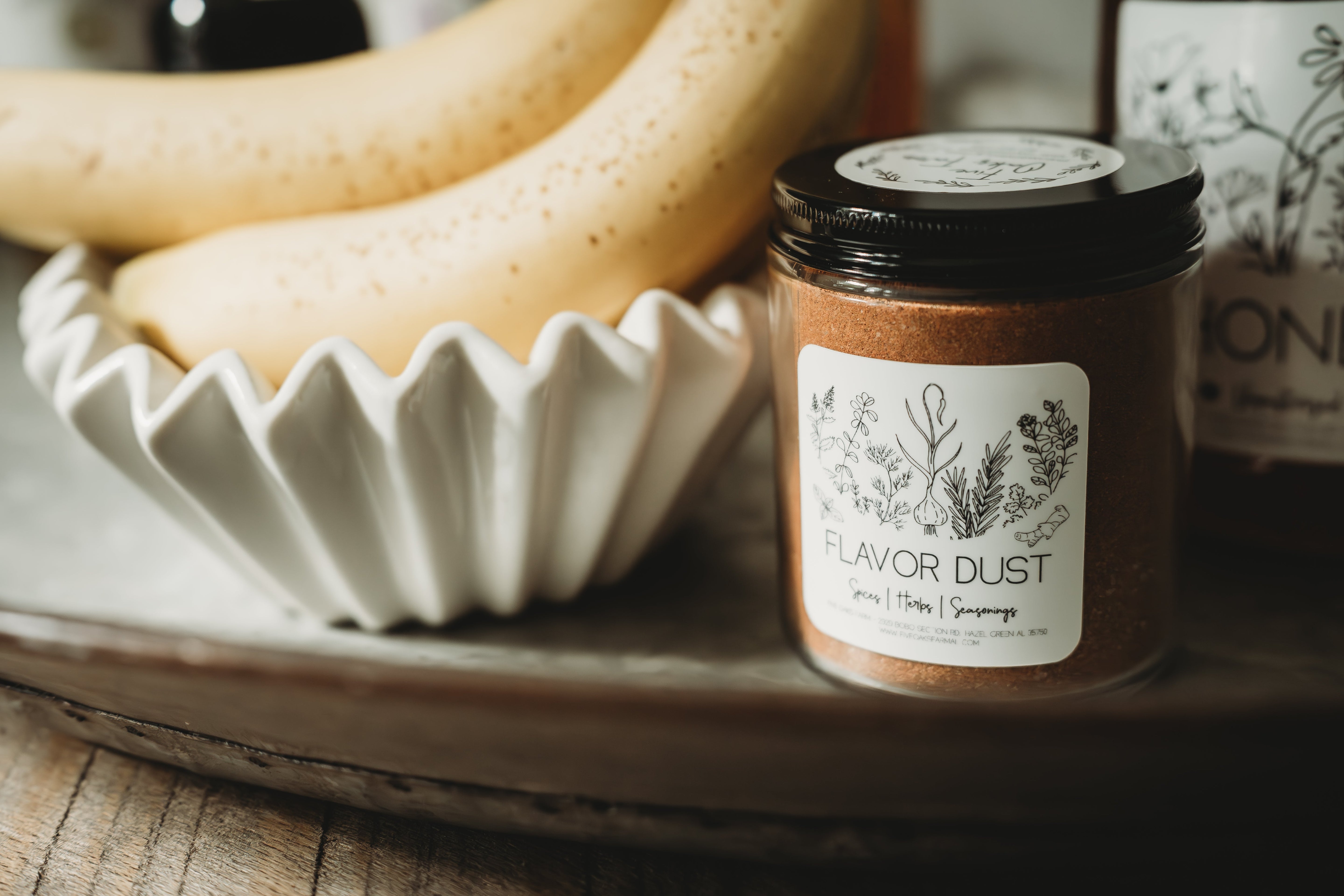 Five Oaks Farm Flavor Dust shaker with natural spice blend, showcasing the From the Farm product from Five Oaks Farm.