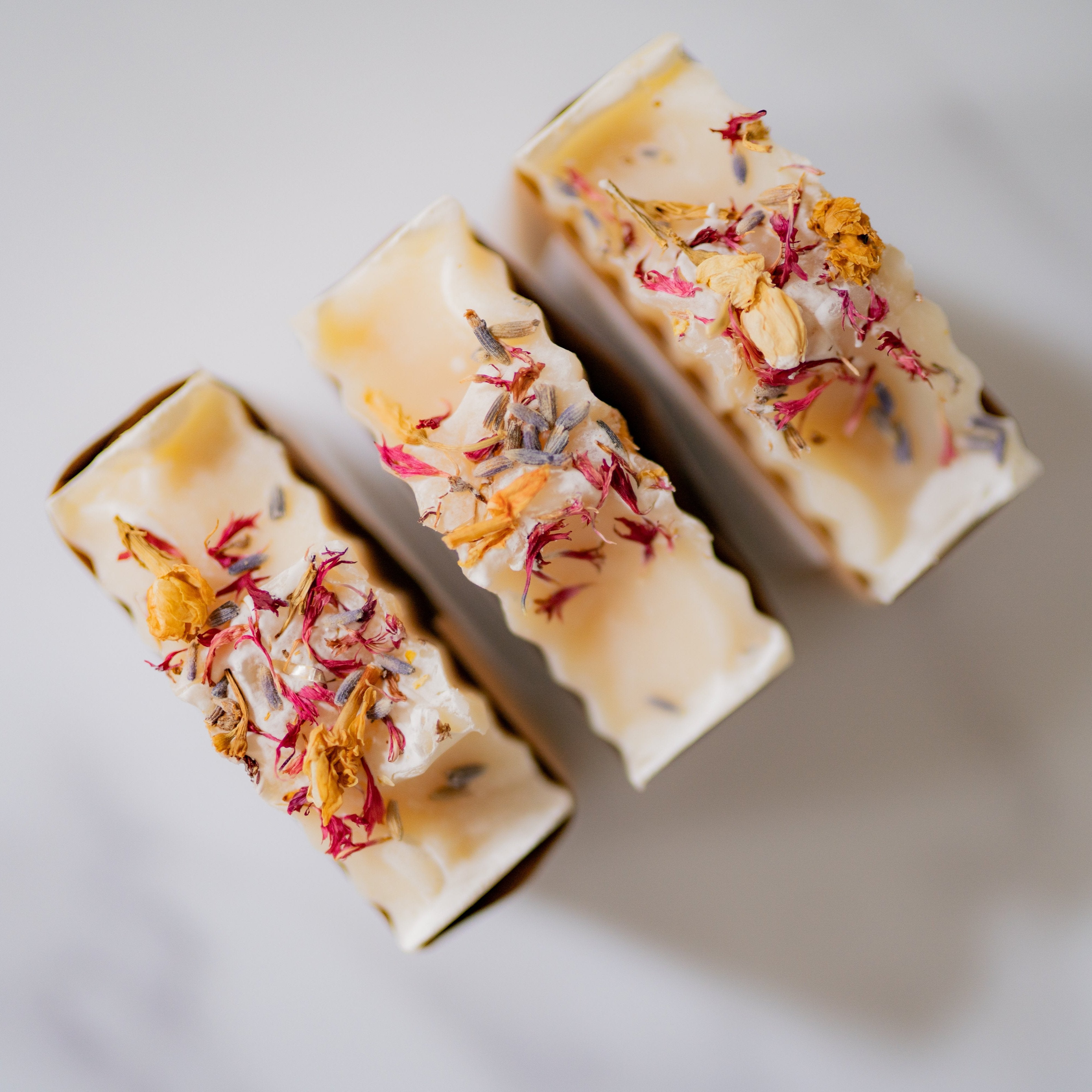 Handmade soap from Five Oaks Farm with lemon and honey scent, showcasing a rustic, artisanal farm-made soap bar.