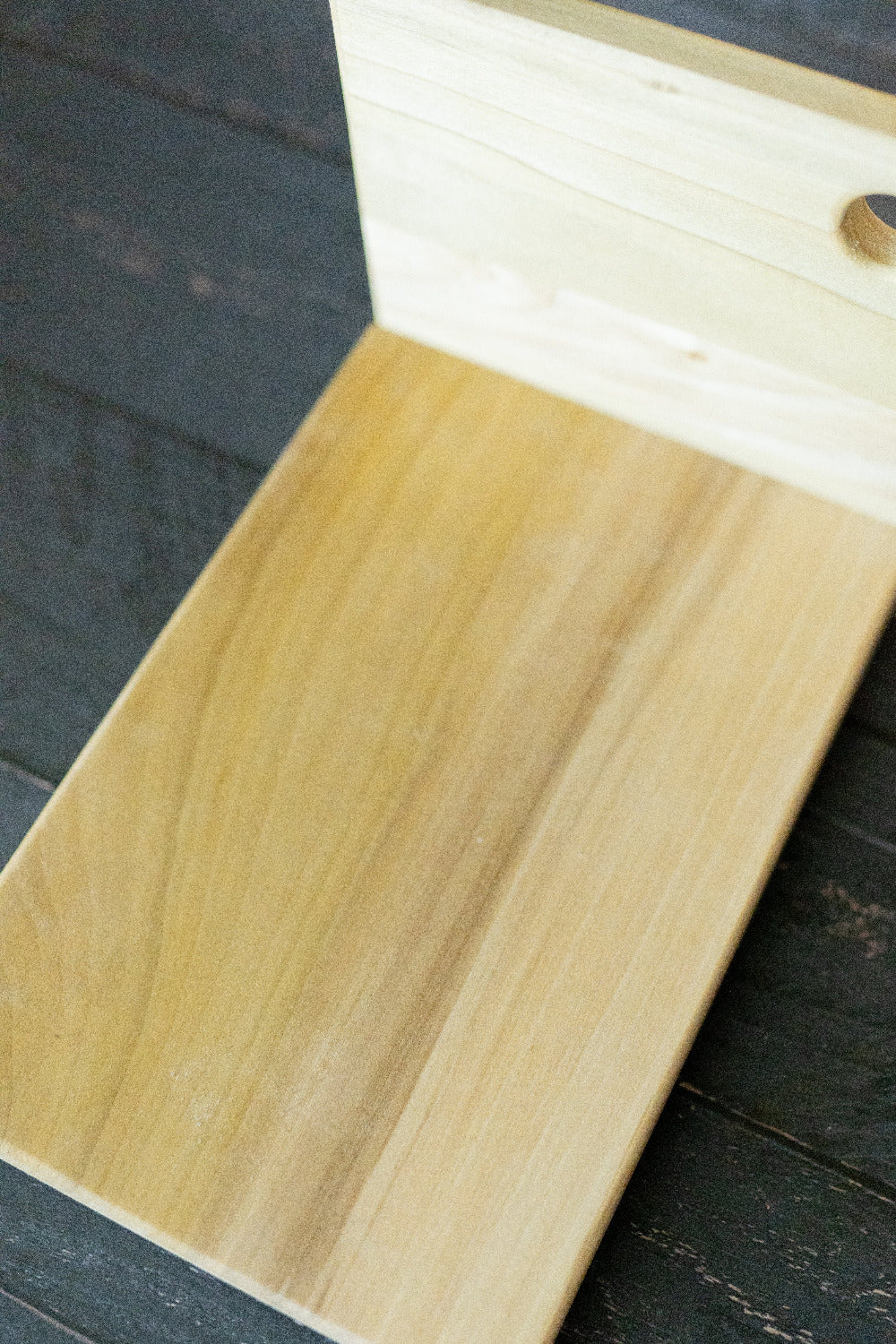 Five Oaks Farm maple vertical cutting board with a smooth, polished surface and natural wood grain finish.