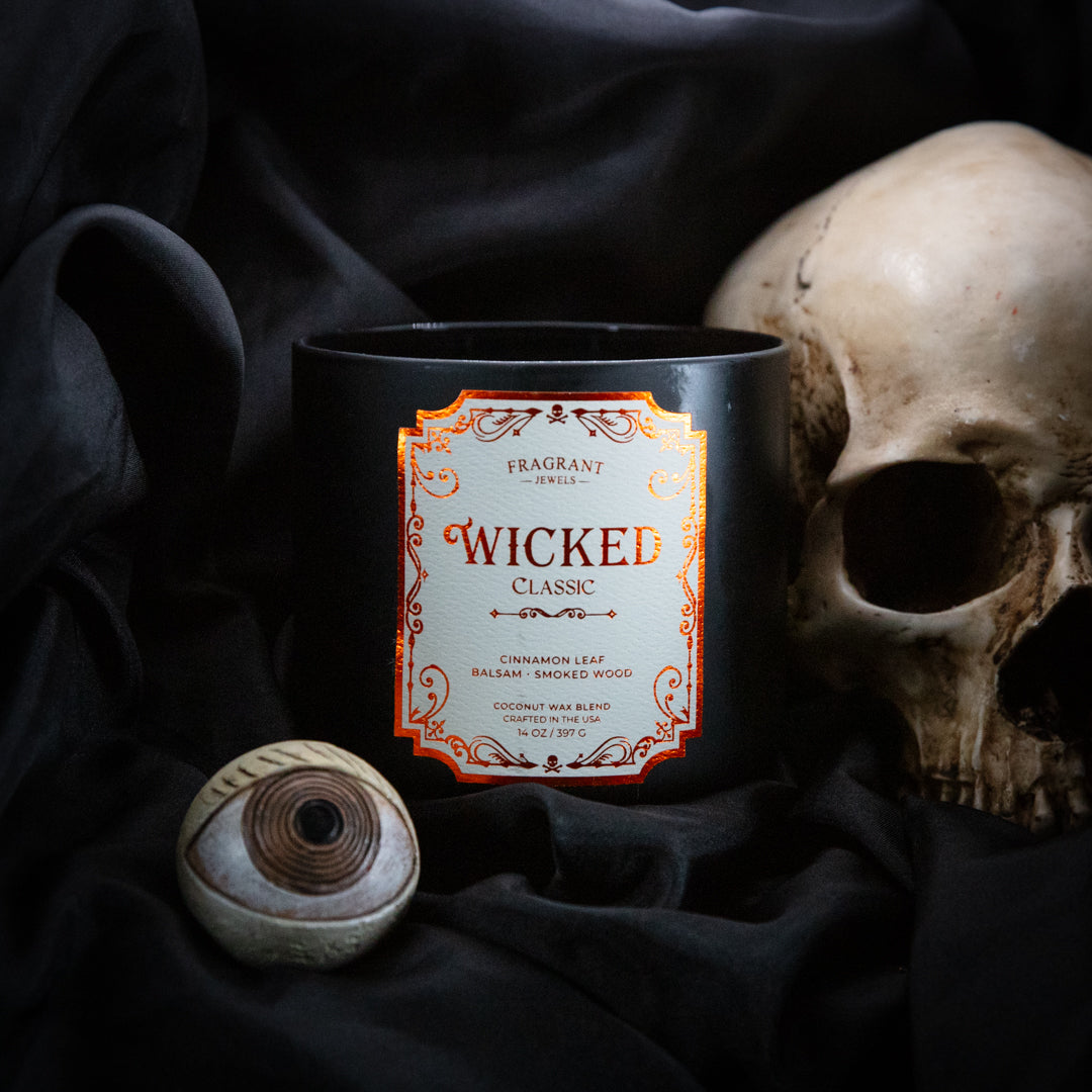 Fragrant Jewels Wicked Classic 2.0 Jewel Candle with embedded ring, scented wax in a decorative candle for elegant home decor.