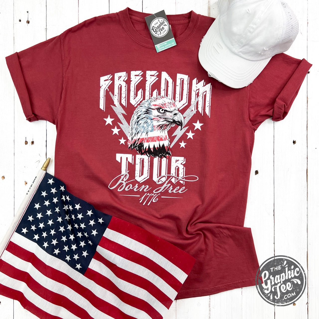 Unisex Freedom Tour Eagle graphic short sleeve T-shirt by The Graphic Tee, featuring a bold eagle design on soft fabric.