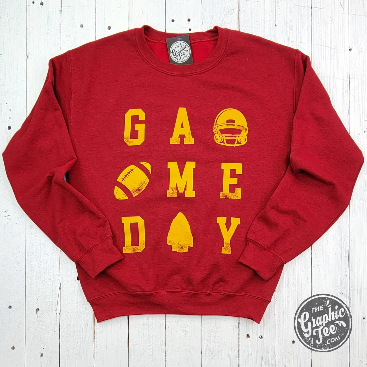 Red and gold crewneck sweatshirt featuring Kansas City graphics, made by The Graphic Tee, casual apparel for game day.