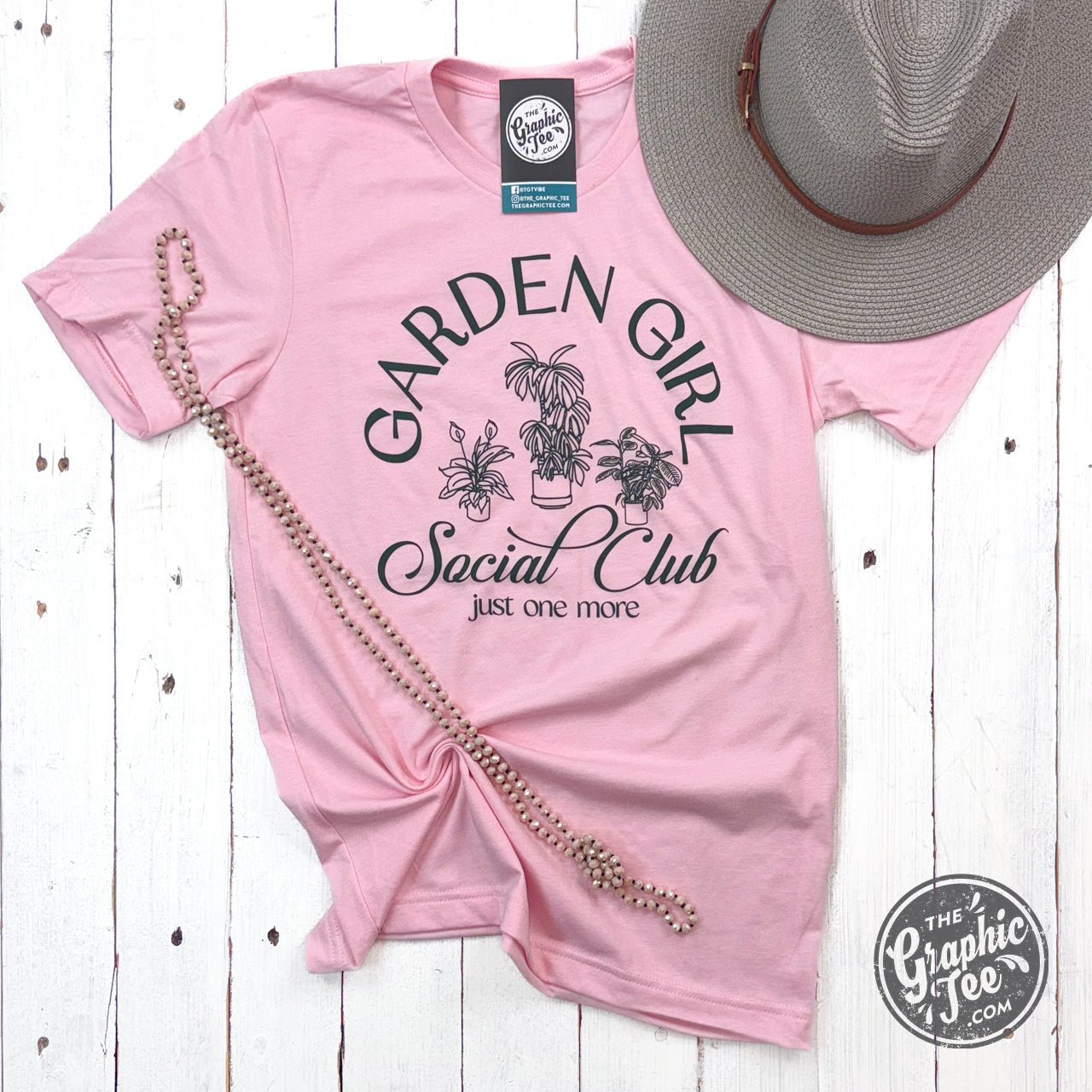Garden Girl Social Club short sleeve crew neck graphic tee by The Graphic Tee, featuring a vibrant garden-themed design.