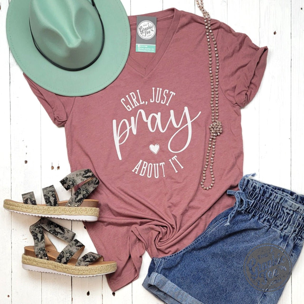 Unisex Heather Mauve V-neck T-shirt for girls with "Just Pray About It" graphic, from The Graphic Tee brand.