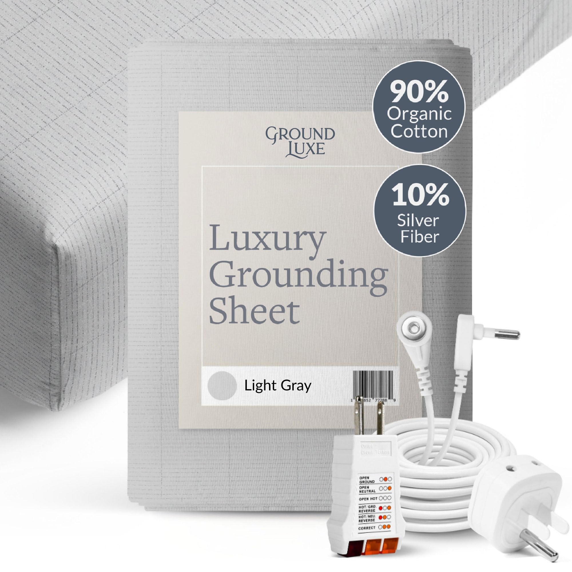 Dark gray GroundLuxe fitted grounding sheet made of organic cotton, king size 80x76 inches, lying flat on a bed.