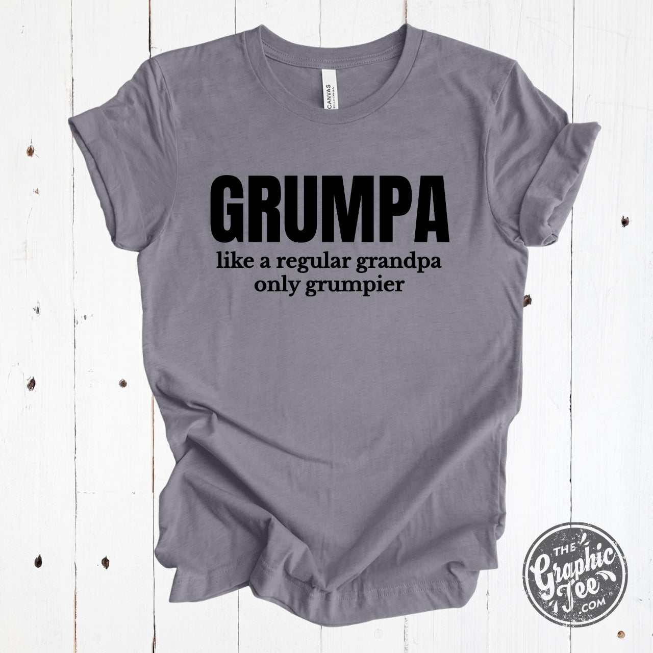 Heather gray graphic tee featuring a humorous "Grumpa, Like a Regular Grandpa Only Grumpier" design by The Graphic Tee.