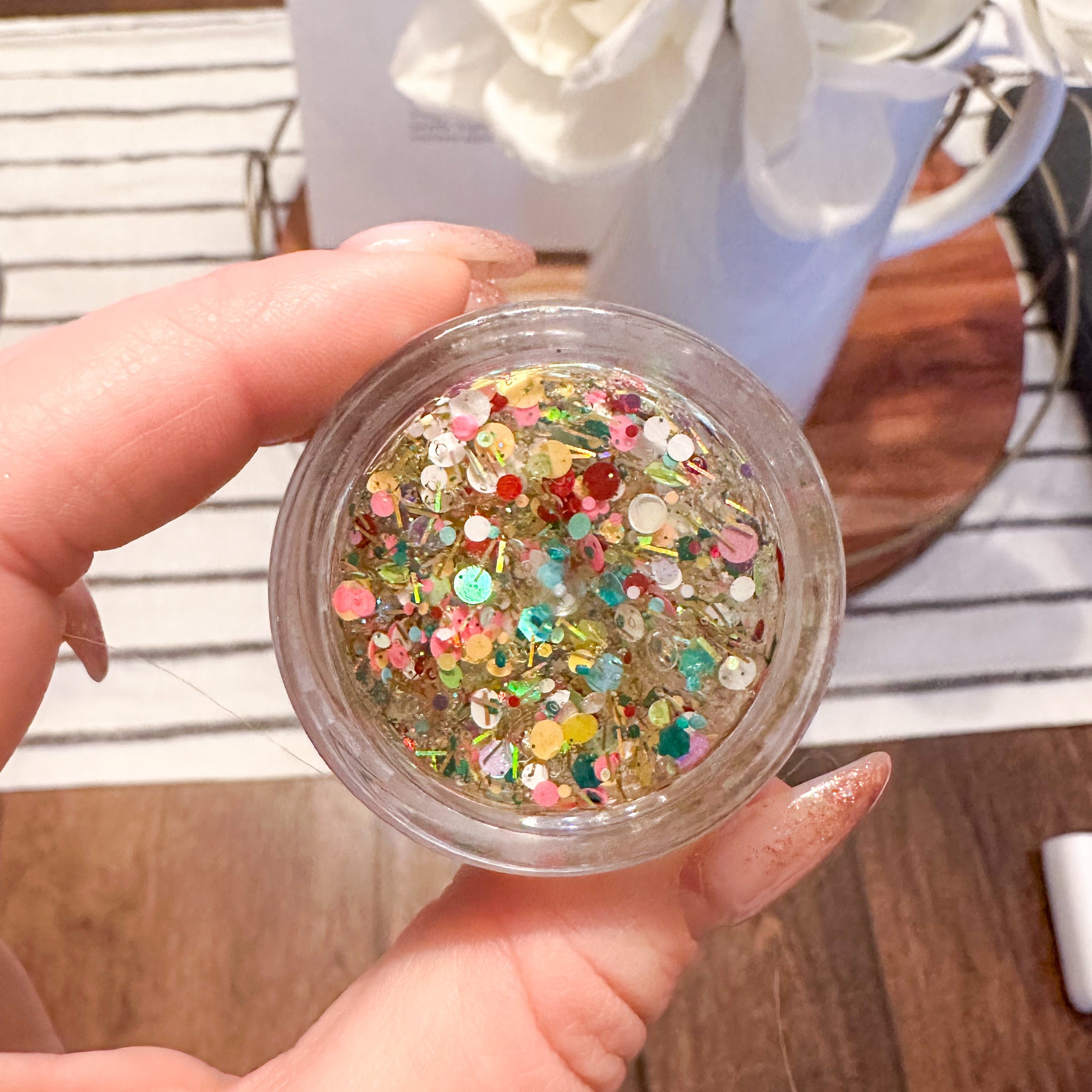 Colorful headband with glitter design from Gussy Up Bow Co.'s End of the Rainbow Hair Glitter collection.