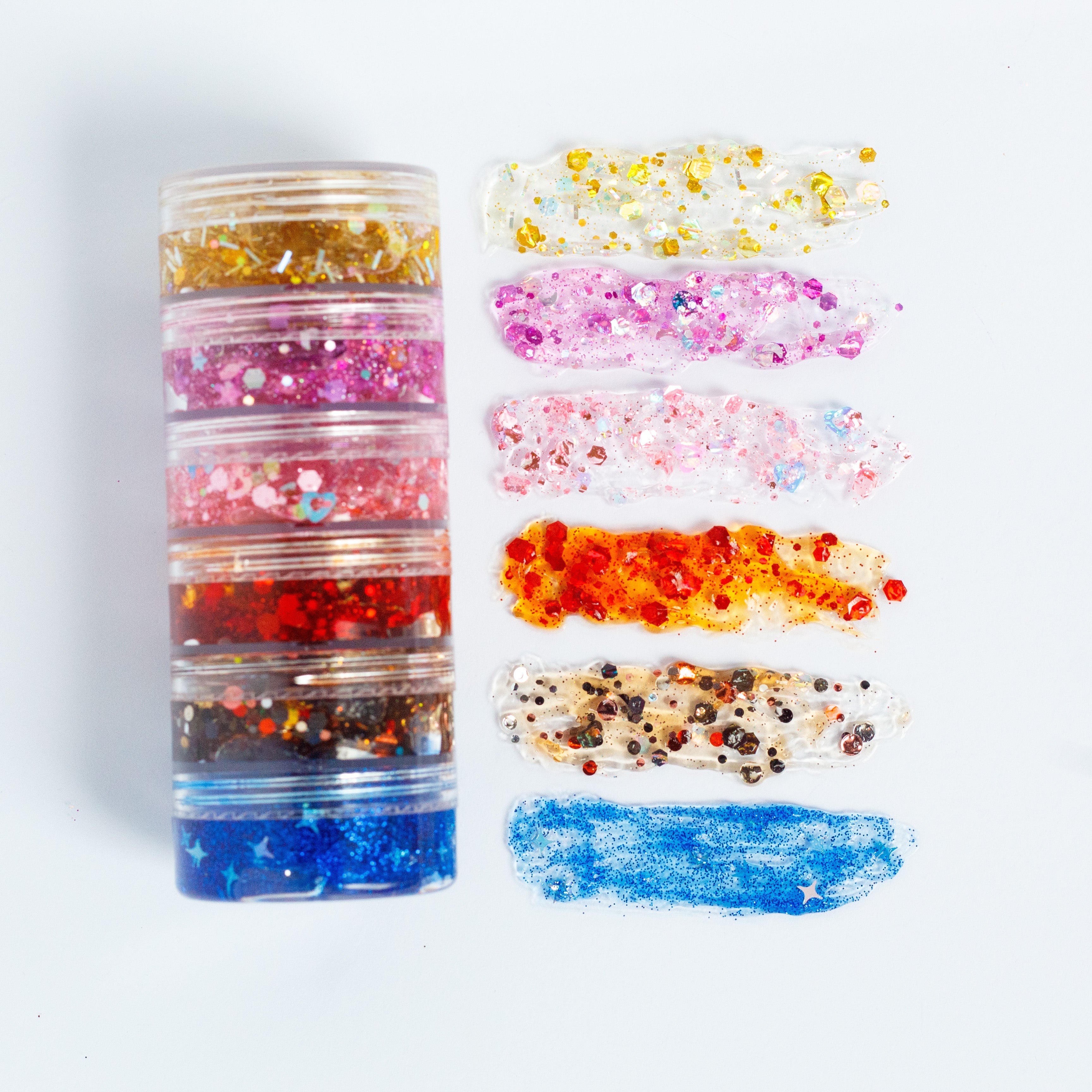 Gussy Up Bow Co. Eras Hair Glitter Stack headbands with sparkly, colorful glitter designs for stylish hair accessory.