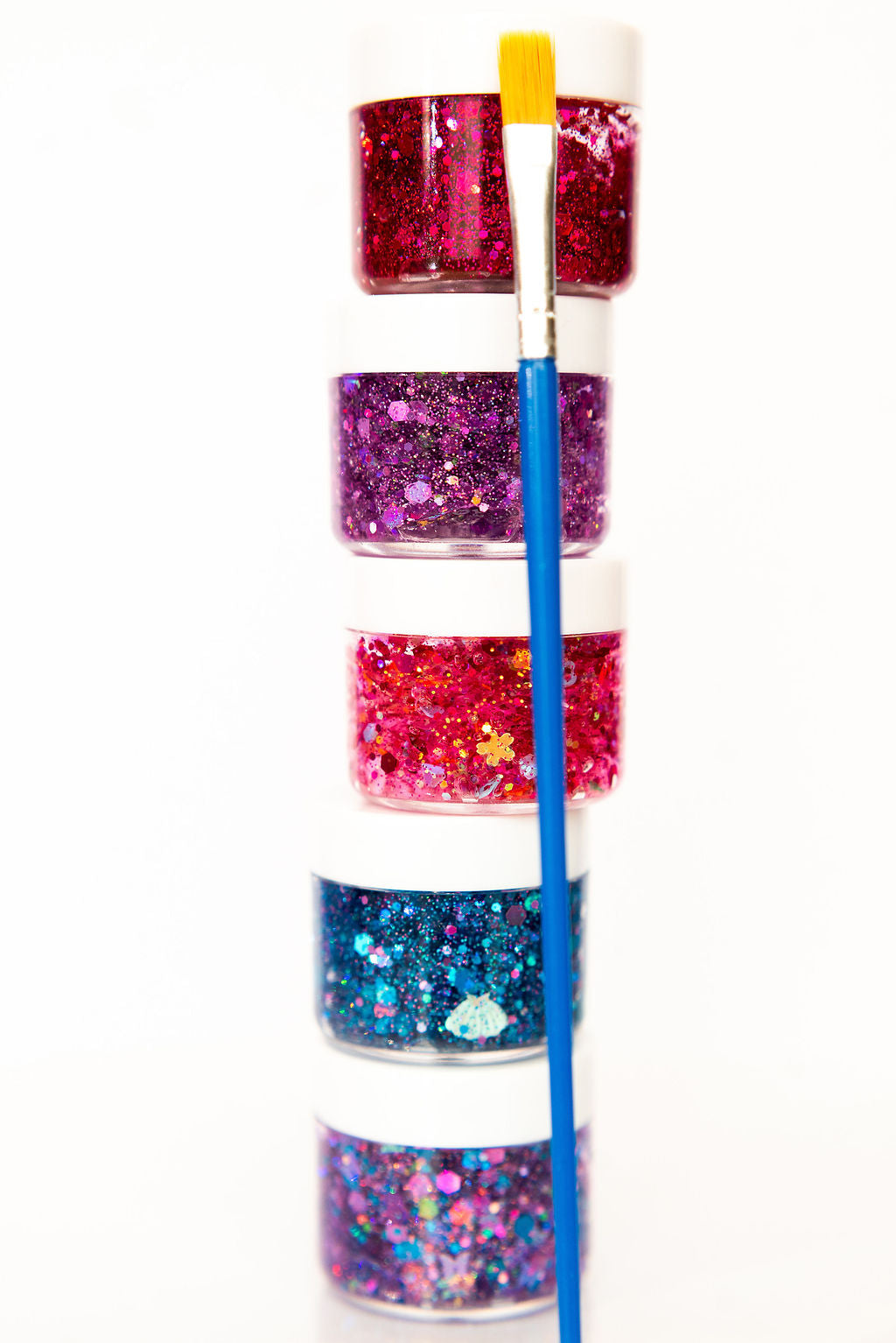 Gussy Up Bow Co. mermaid hair glitter headband with sparkling, colorful glitter accents and a comfortable band design.