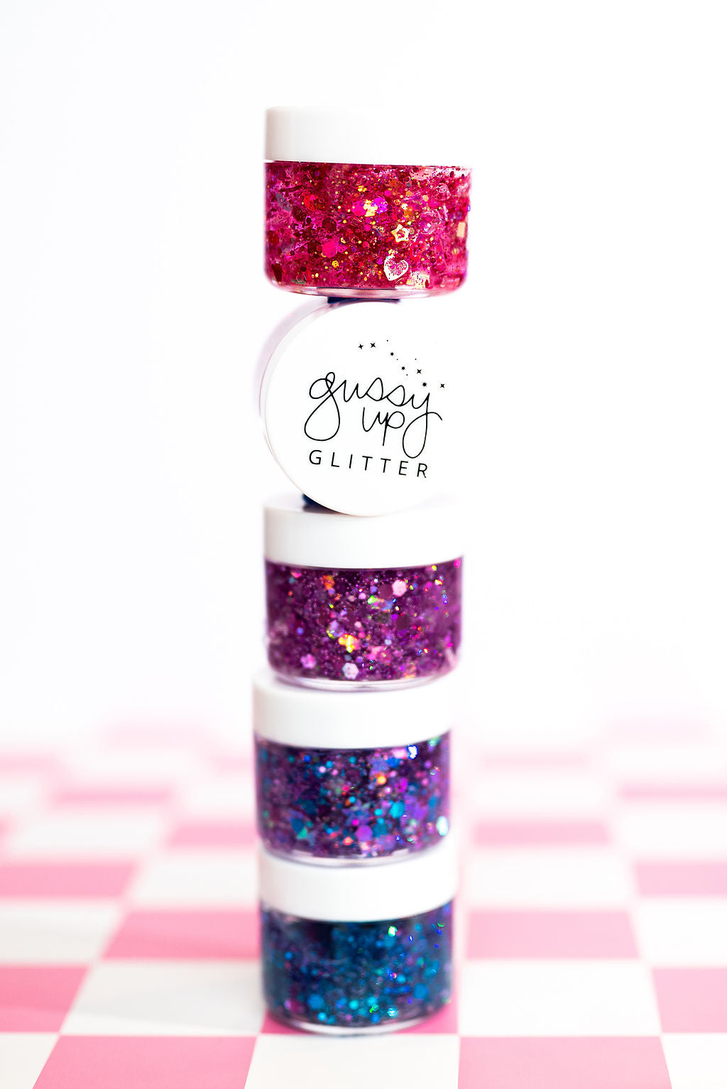 Multicolor hair glitter headbands by Gussy Up Bow Co. featuring vibrant, sparkling glitter accents on stylish headbands.