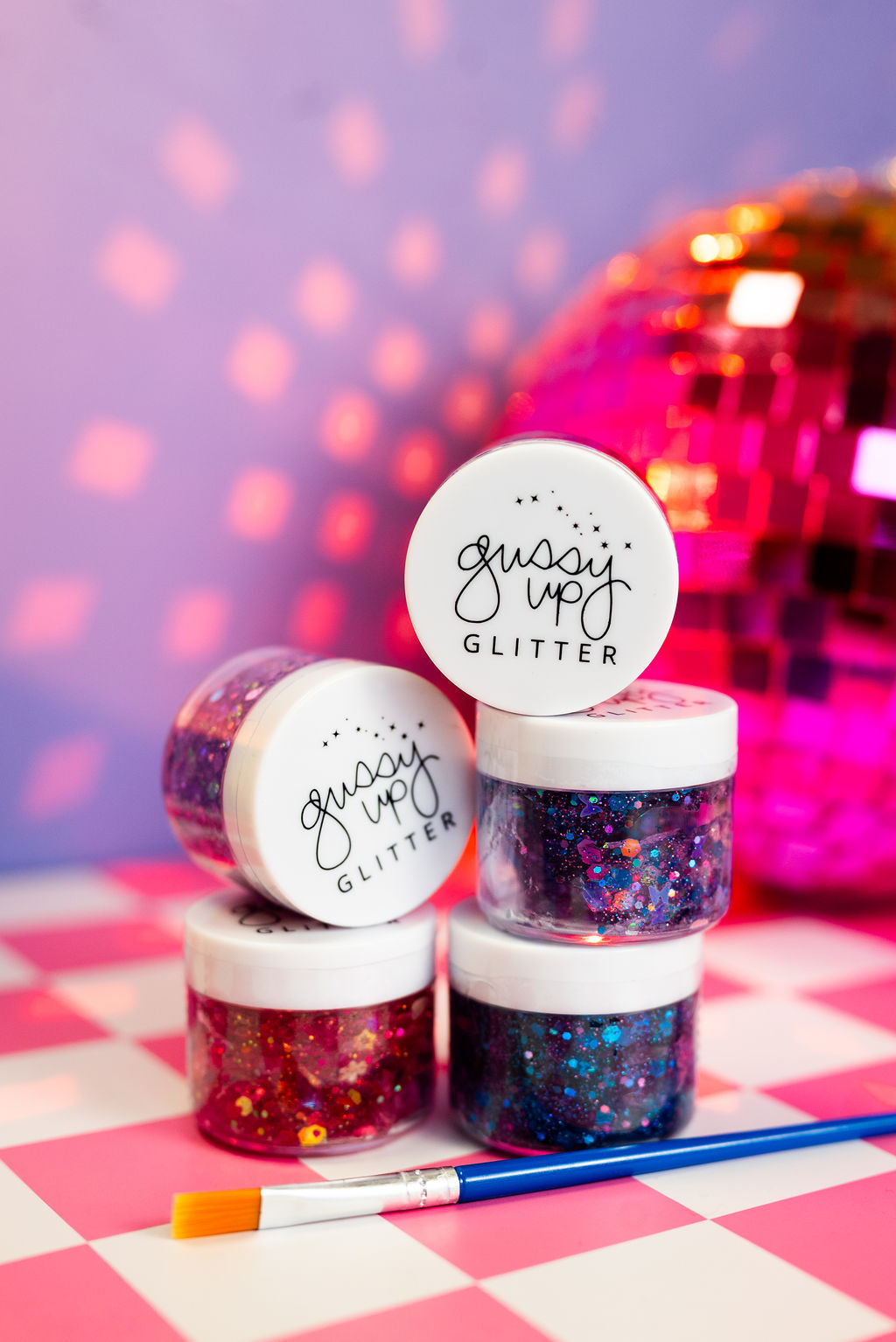 Multicolor hair glitter headbands by Gussy Up Bow Co. featuring vibrant, sparkly designs for stylish hair accessories.