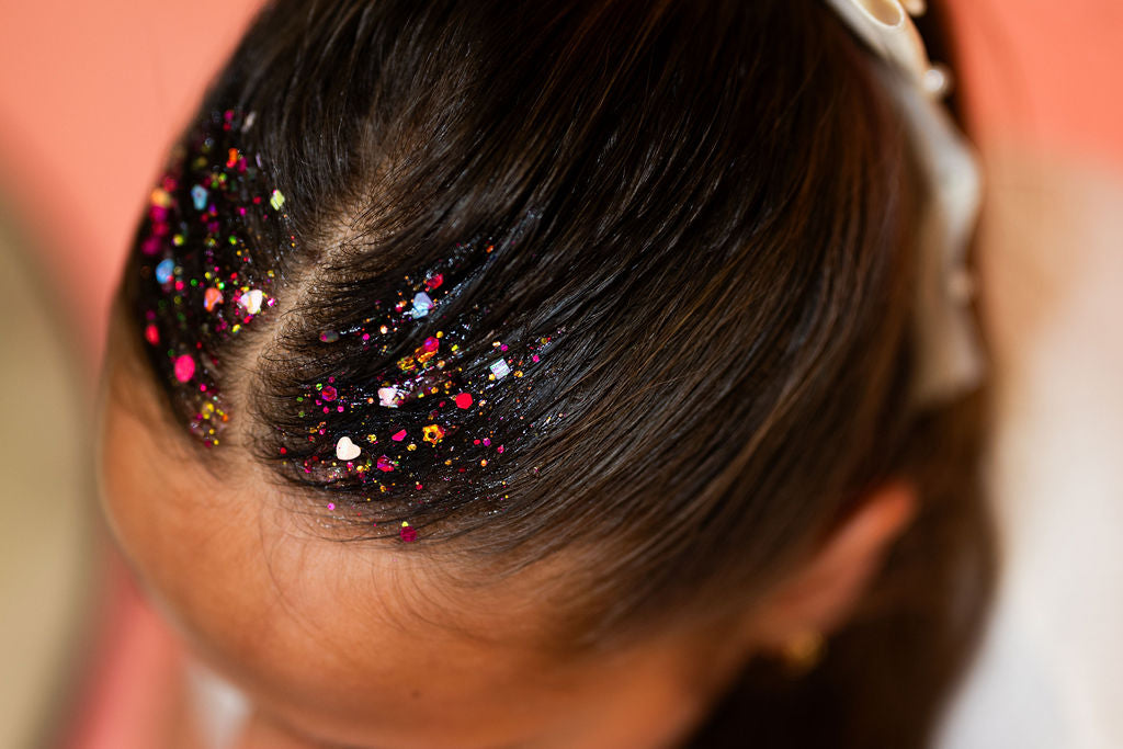 Multicolor hair glitter headband by Gussy Up Bow Co., featuring vibrant, sparkling glitter design for festive or stylish looks.