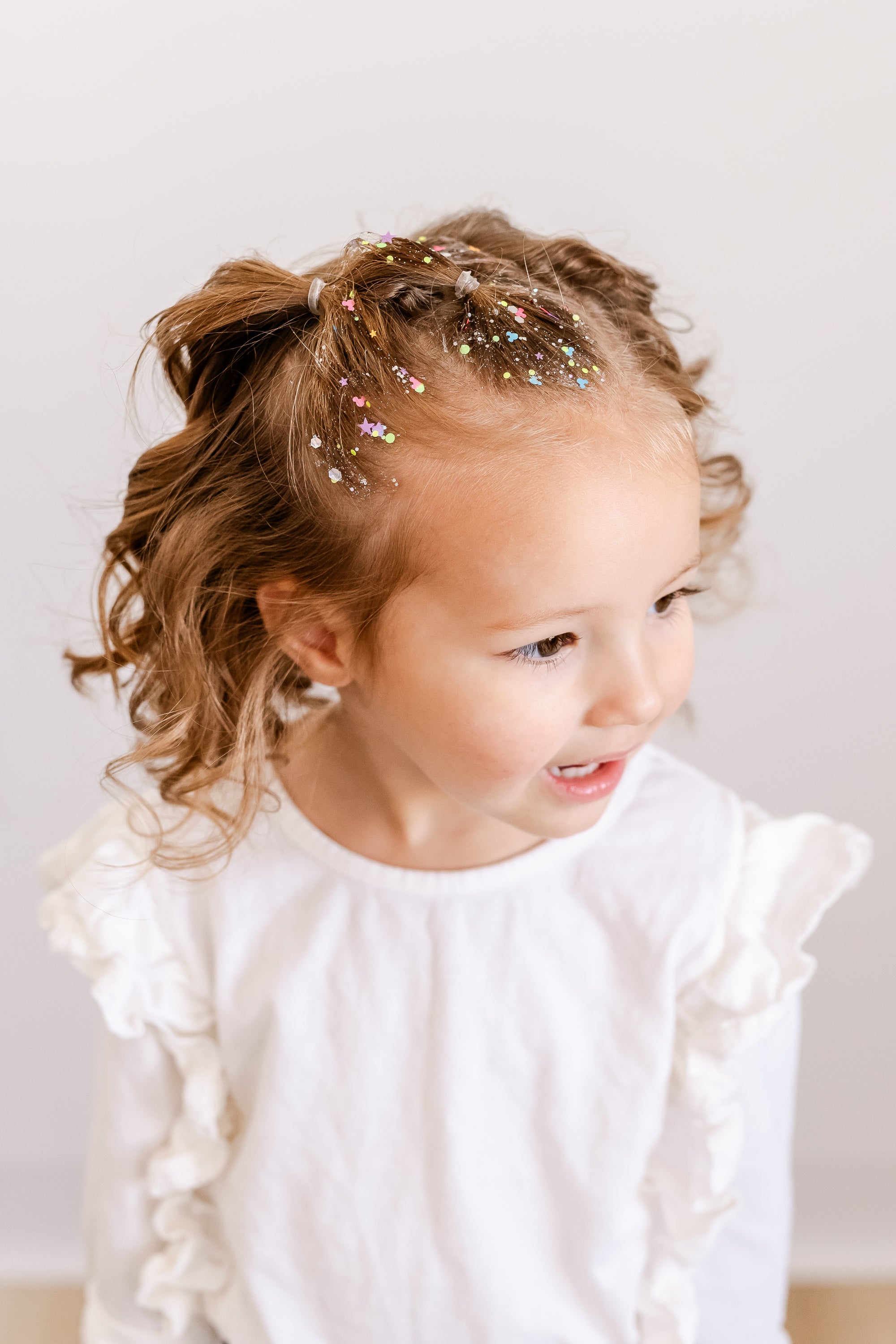 Gussy Up Bow Co. Pixie Dust Hair Glitter headband with shimmering glitter design for festive and stylish hair accessories.
