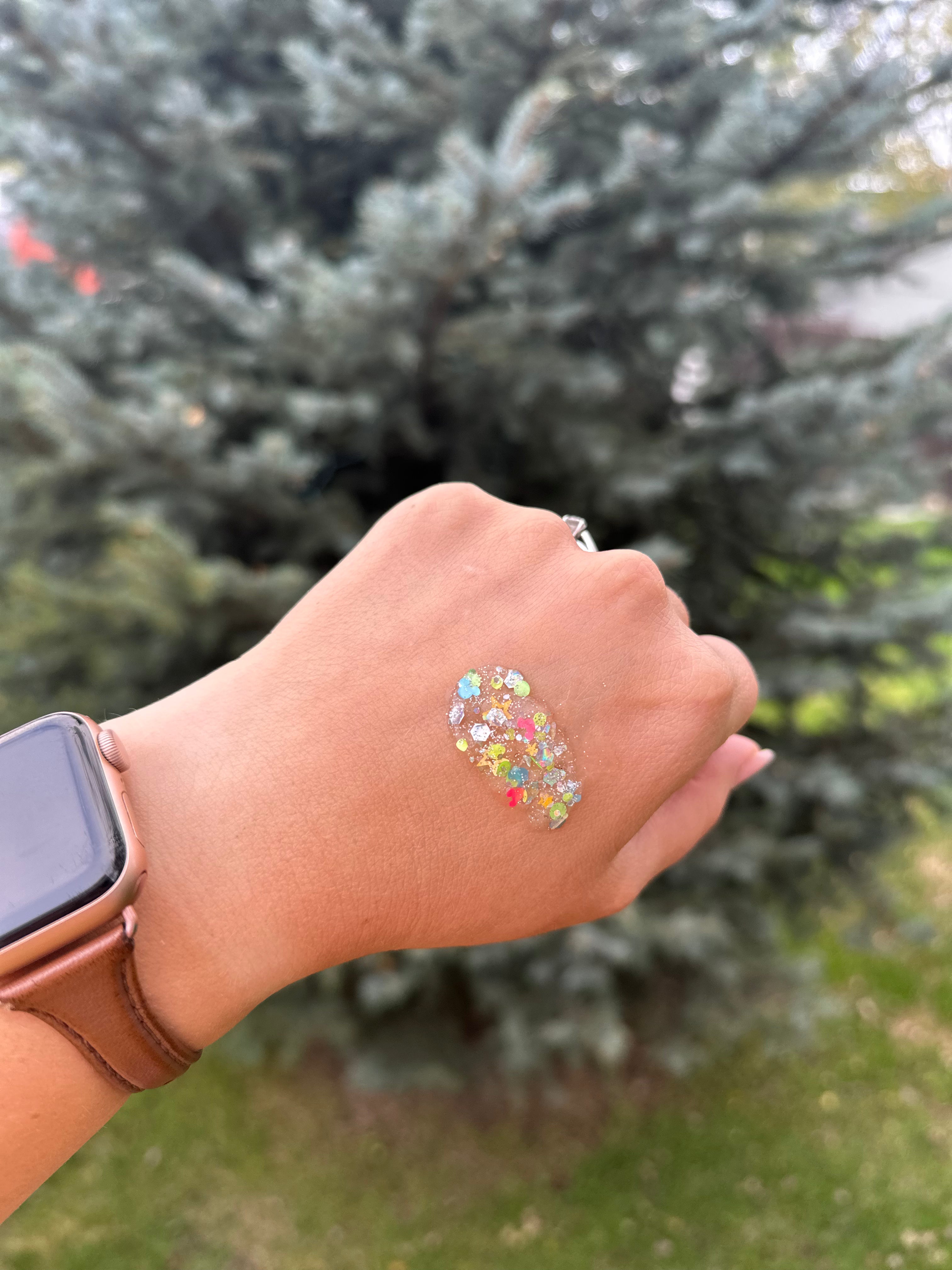 Gussy Up Bow Co. Pixie Dust Hair Glitter headband with sparkling glitter and colorful accents, perfect for festive hairstyles.