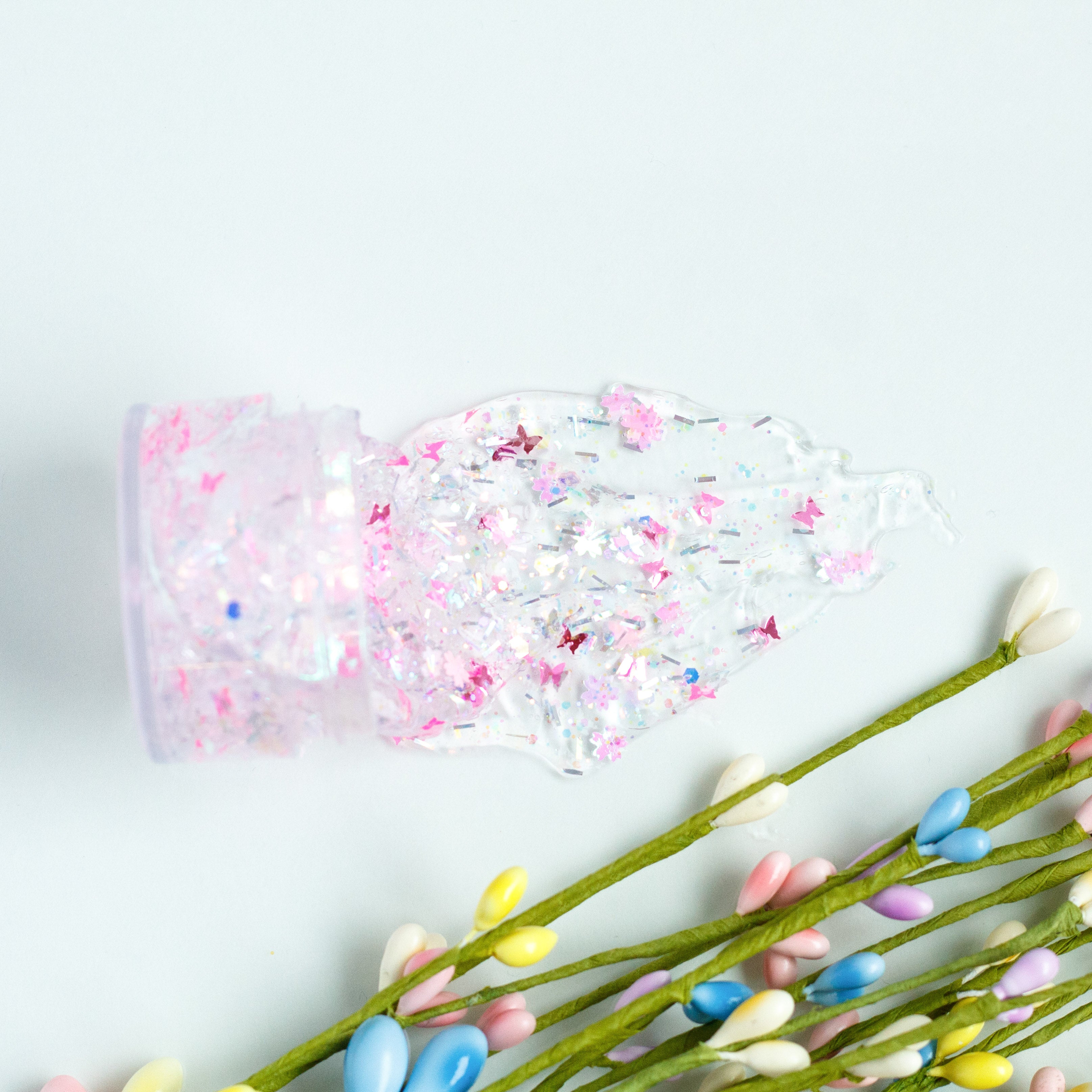 Gussy Up Bow Co. Secret Garden hair glitter headband with sparkling decorative accents and floral design for stylish wear