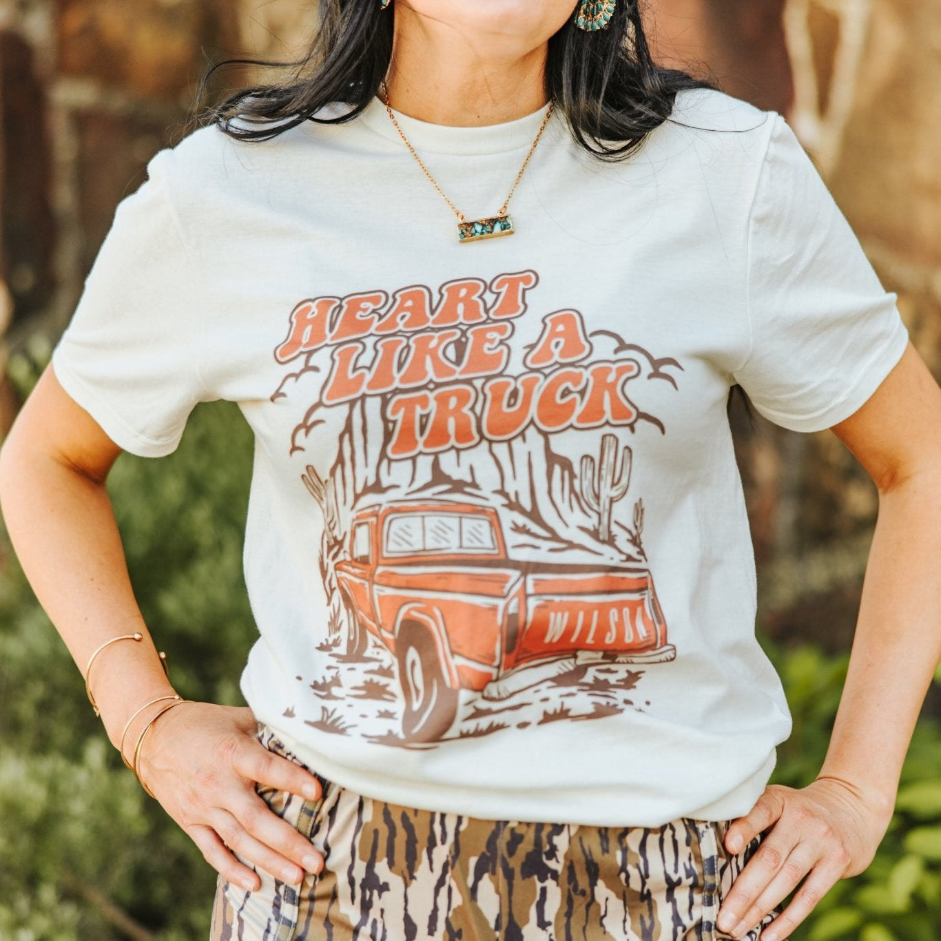 Coral Heart Like A Truck graphic tee by Wild Junkie featuring a truck-shaped heart design on soft cotton fabric.
